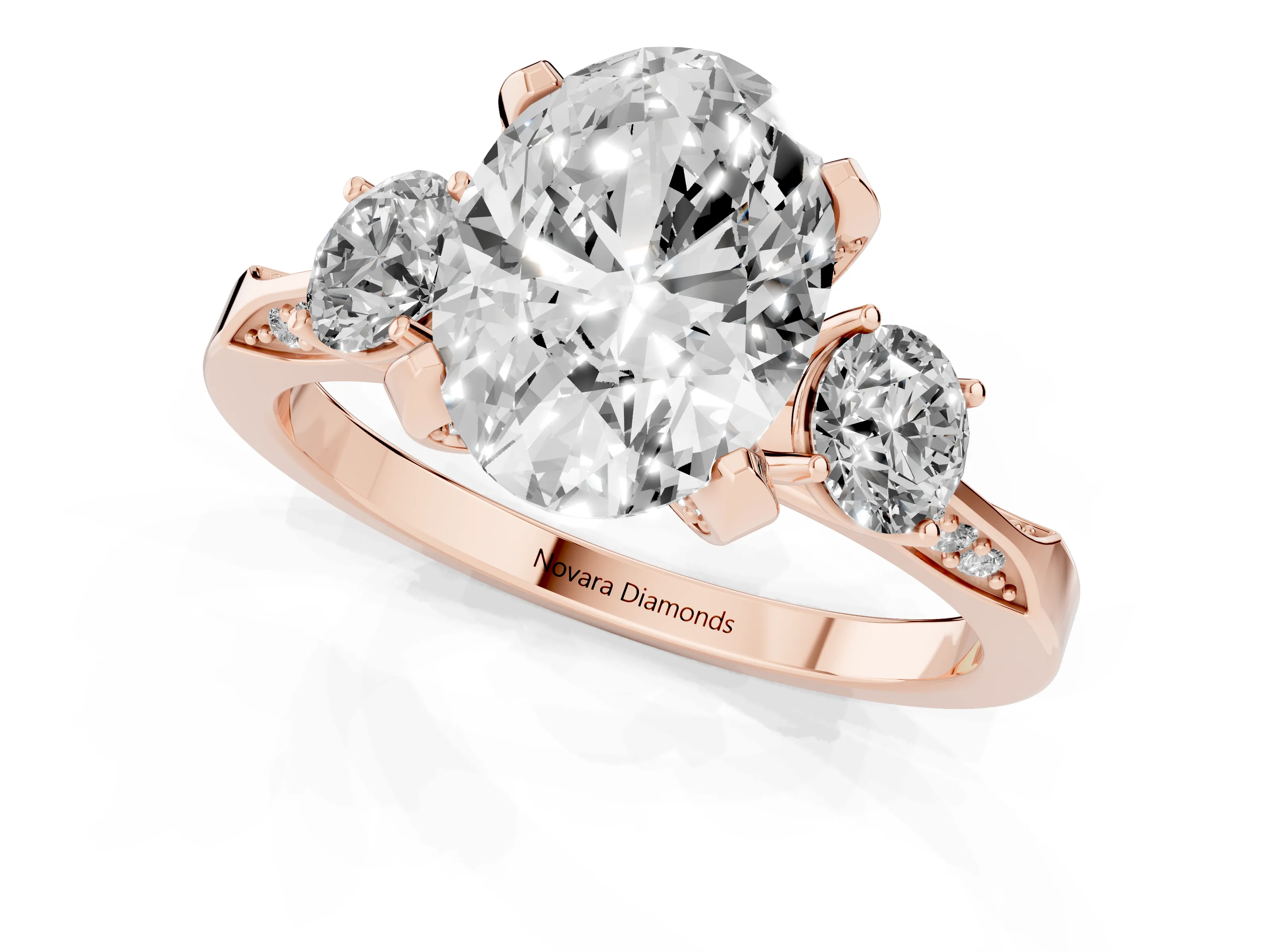 Oval Cut Diamond Three-Stone Ring Set in Rose gold with Pavé Band and Smaller Side Stones