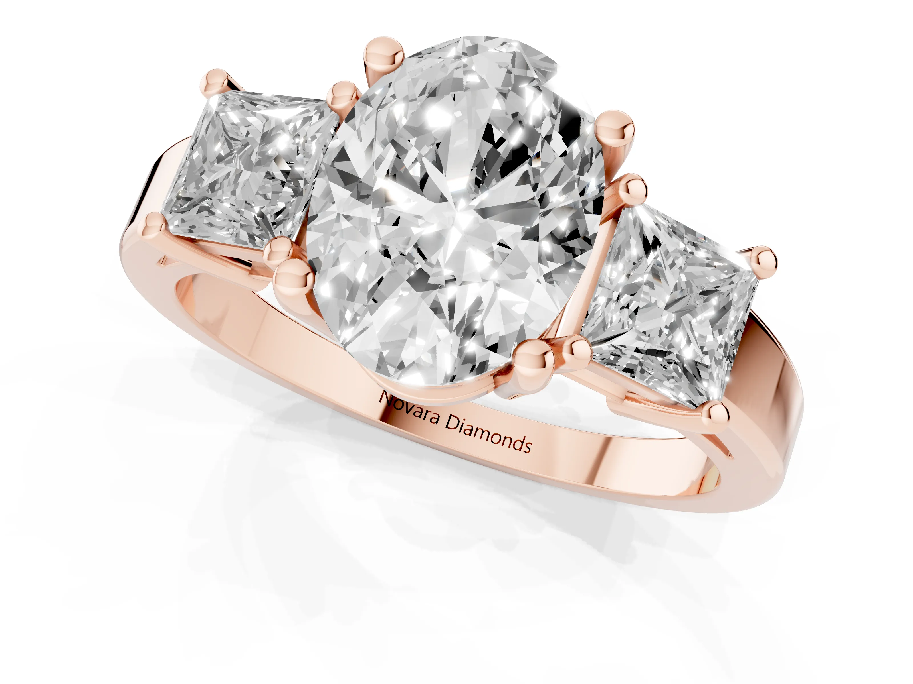 Three-Stone Oval Cut Diamond Solitaire Ring Set in Rose gold with Prong Setting