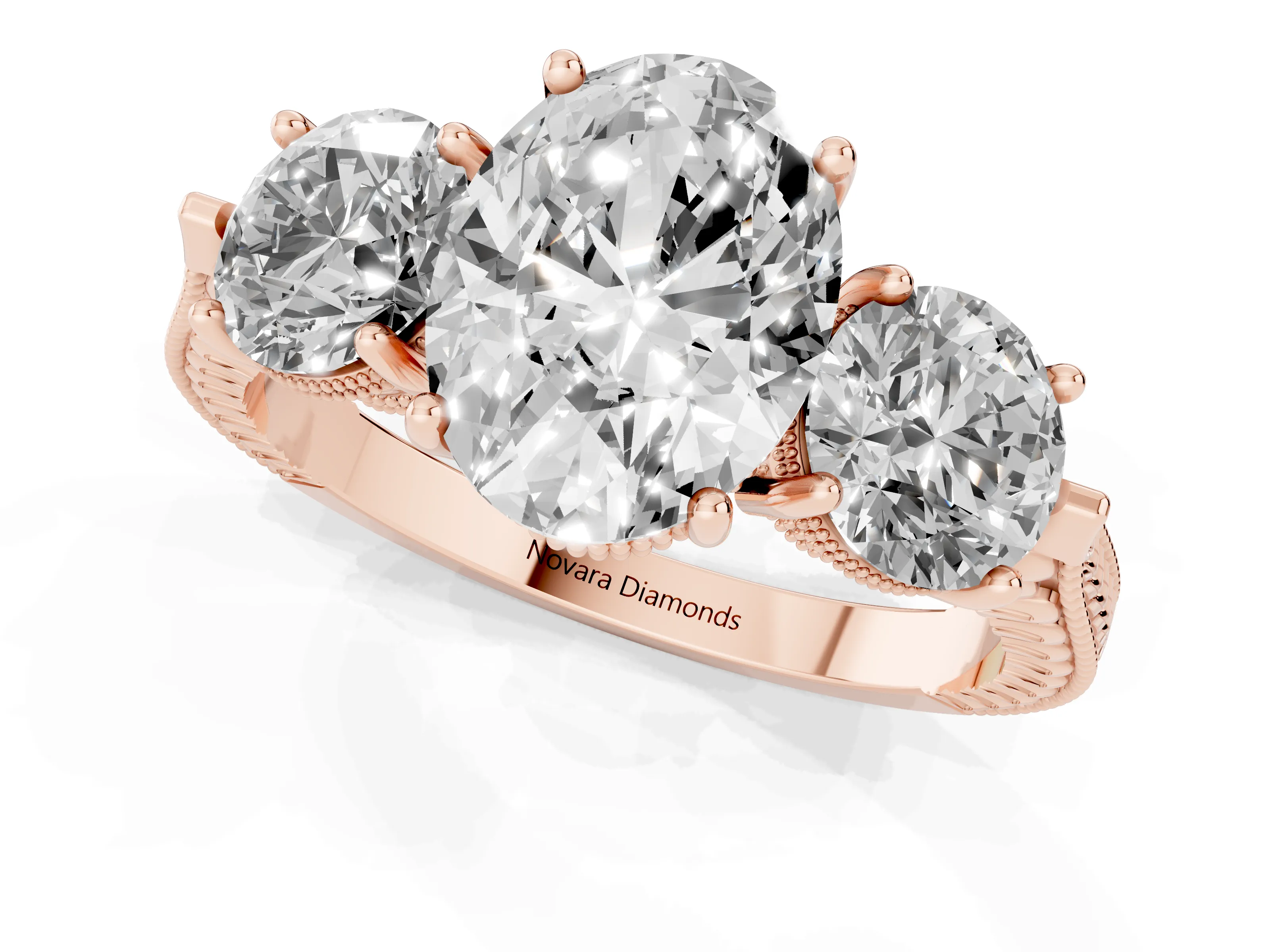 Oval Cut Diamond Three-Stone Ring Set in Rose gold with Milgrain Band