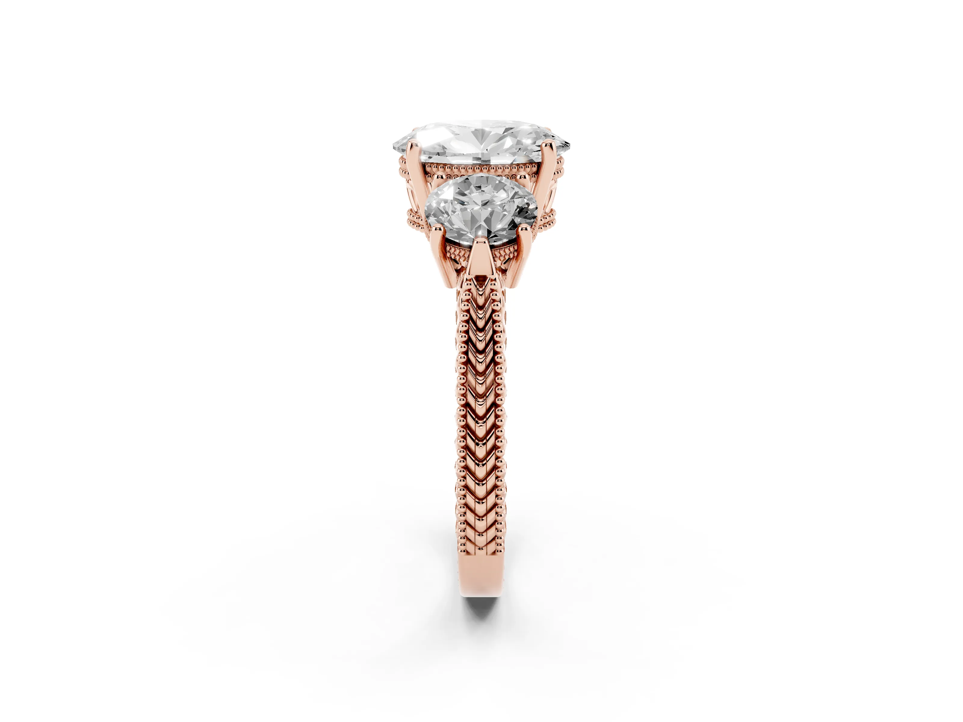 Oval Cut Diamond Three-Stone Ring Set in Rose gold with Milgrain Band