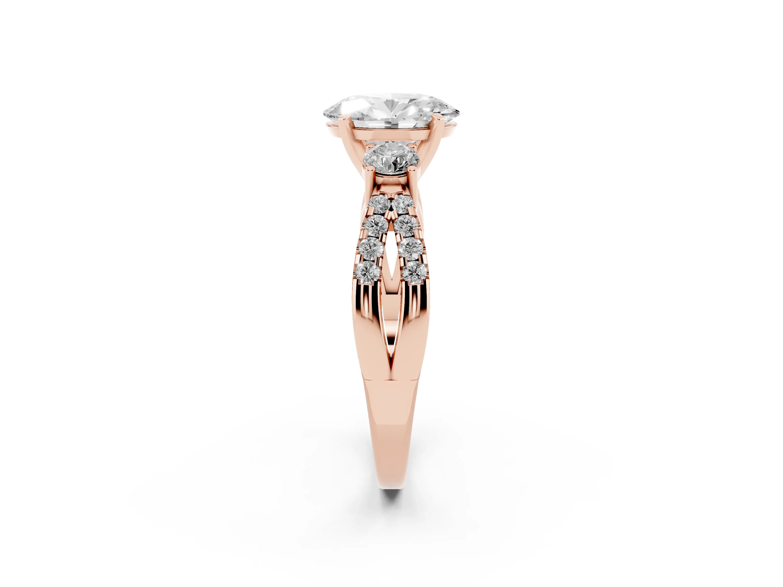 Oval Cut Diamond Three-Stone Ring Set in Rose gold with Pavé Split Shank and Prong Setting