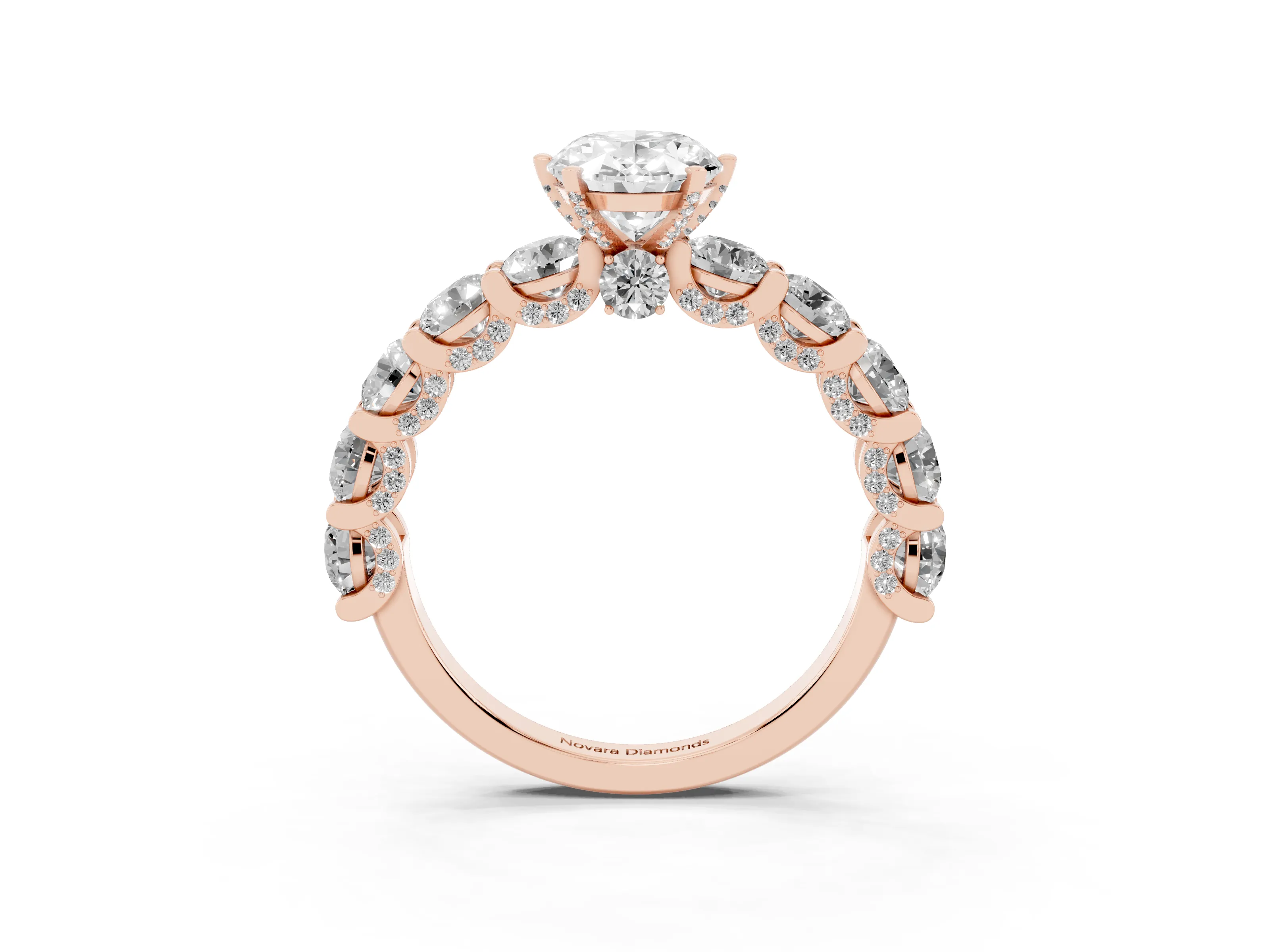 Oval Cut Diamond Side Stone Ring Set in Rose gold with Alternating Round and Oval Side Stones