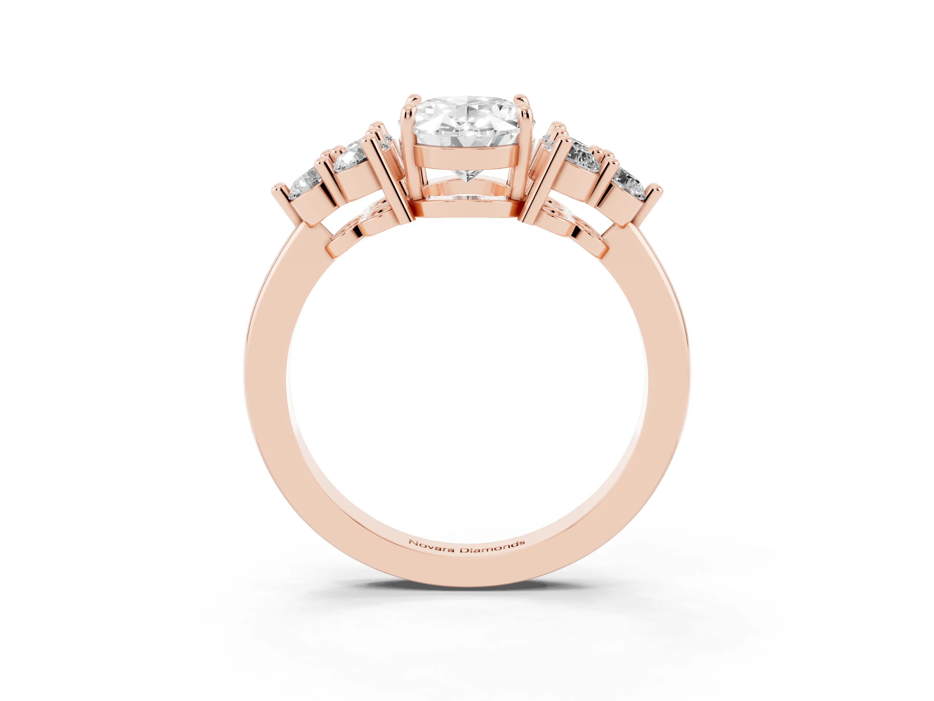 Oval Cut Diamond Solitaire Ring Set in Rose gold with Cluster Accents on Each Side