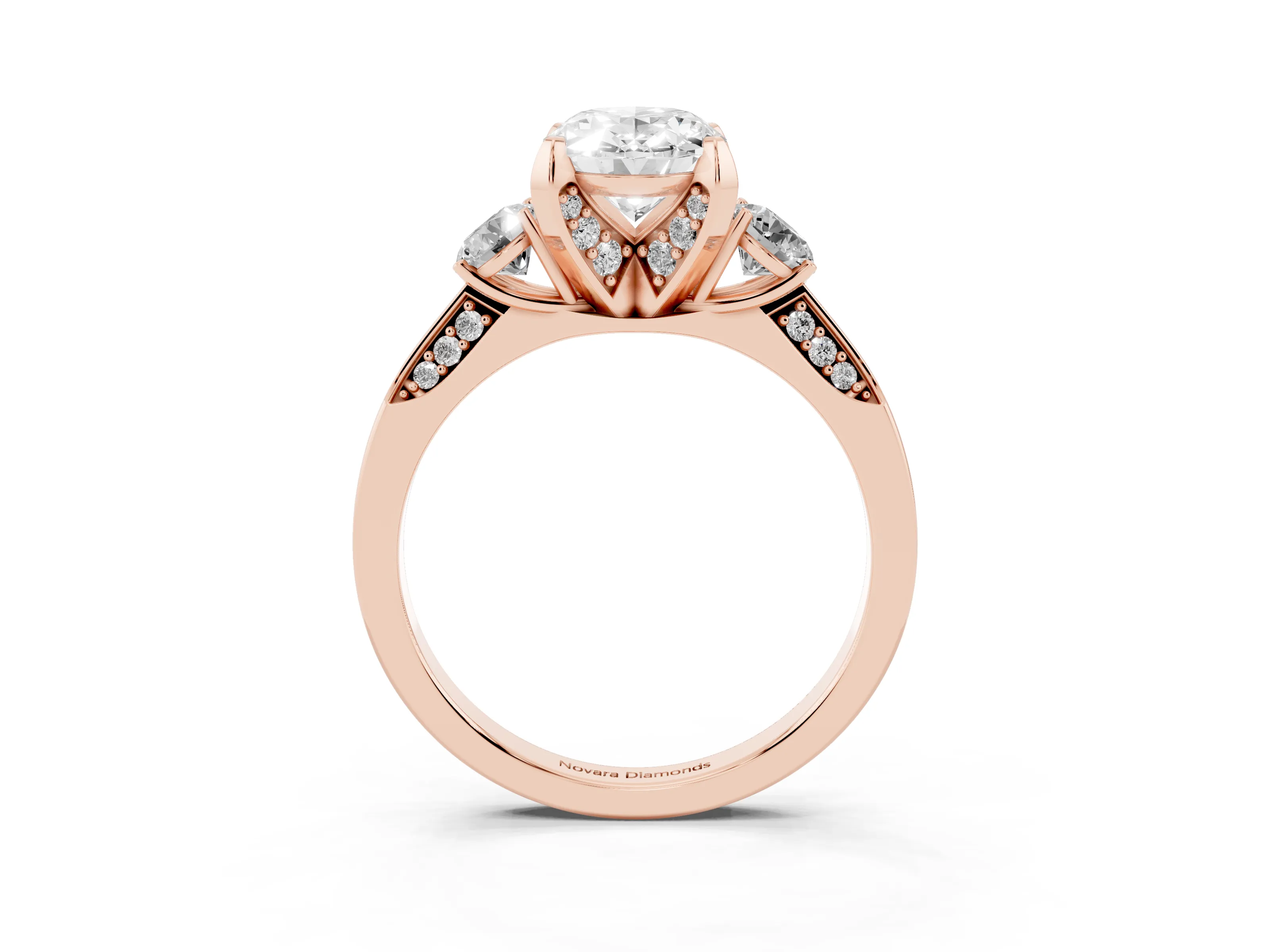 Oval Cut Diamond Three-Stone Ring Set in Rose gold with Pavé Band and Smaller Side Stones