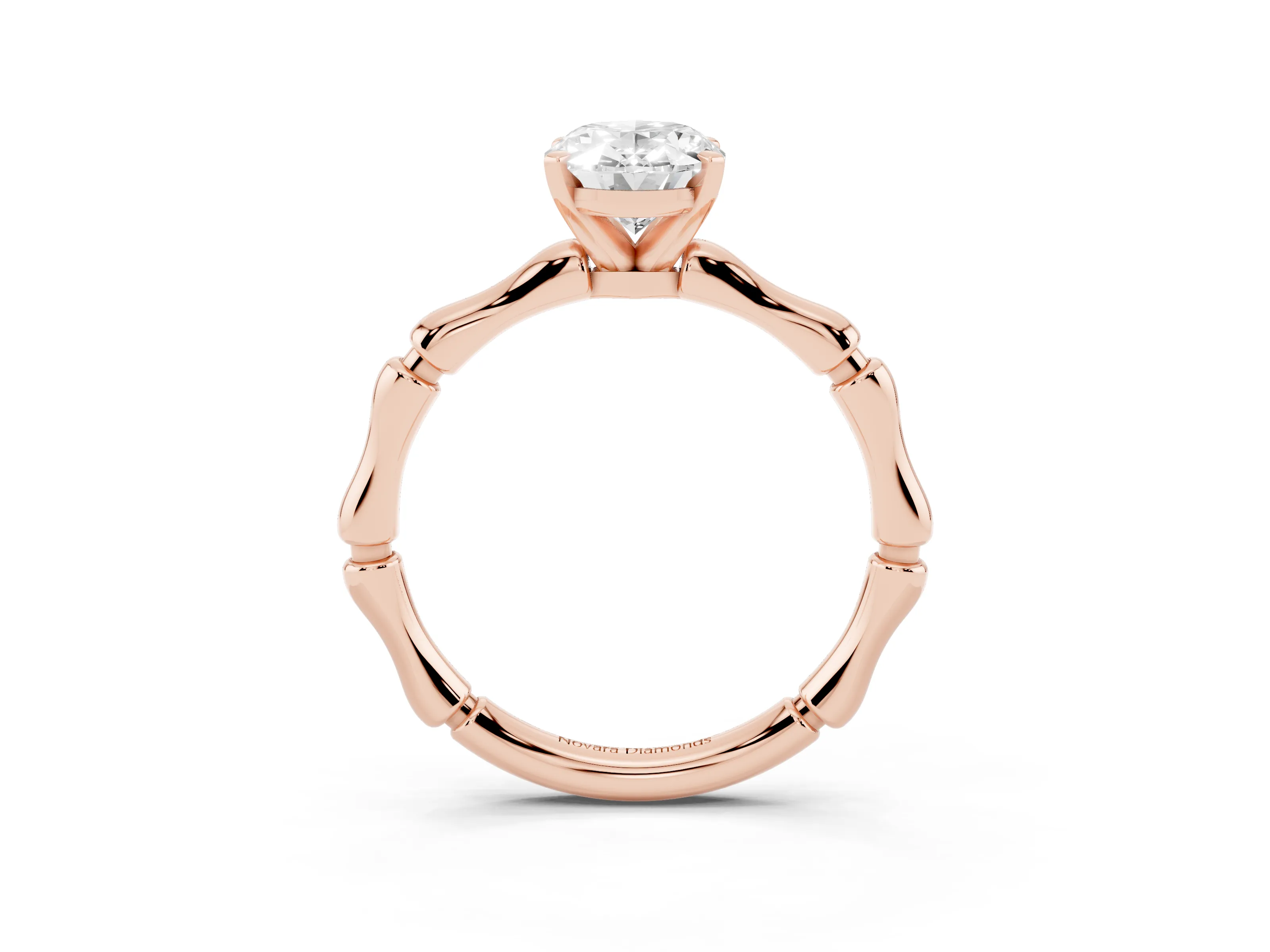 Oval Cut Diamond Solitaire Ring Set in Rose gold with Bamboo Band and Prong Setting