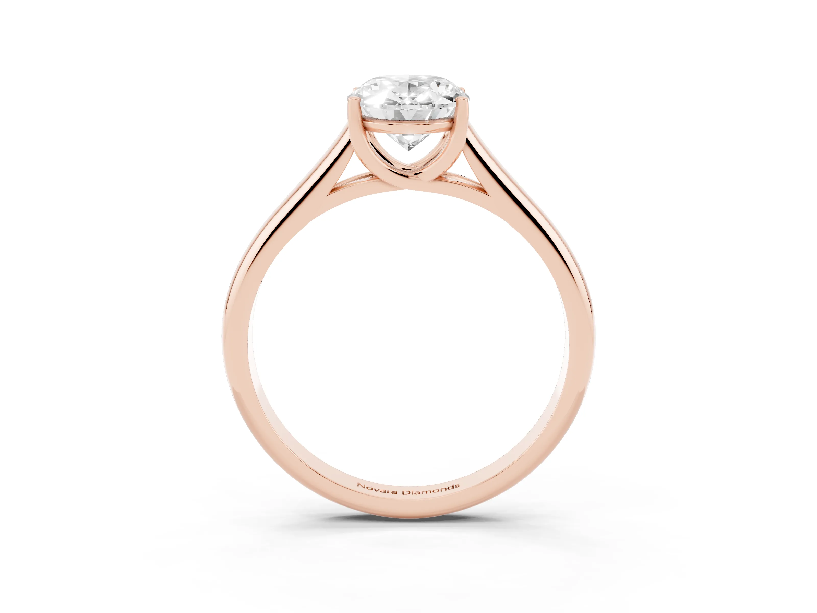 Oval Cut Diamond Solitaire Engagement Ring Set in Rose gold with Subtly Tapered Band and Prong Setting