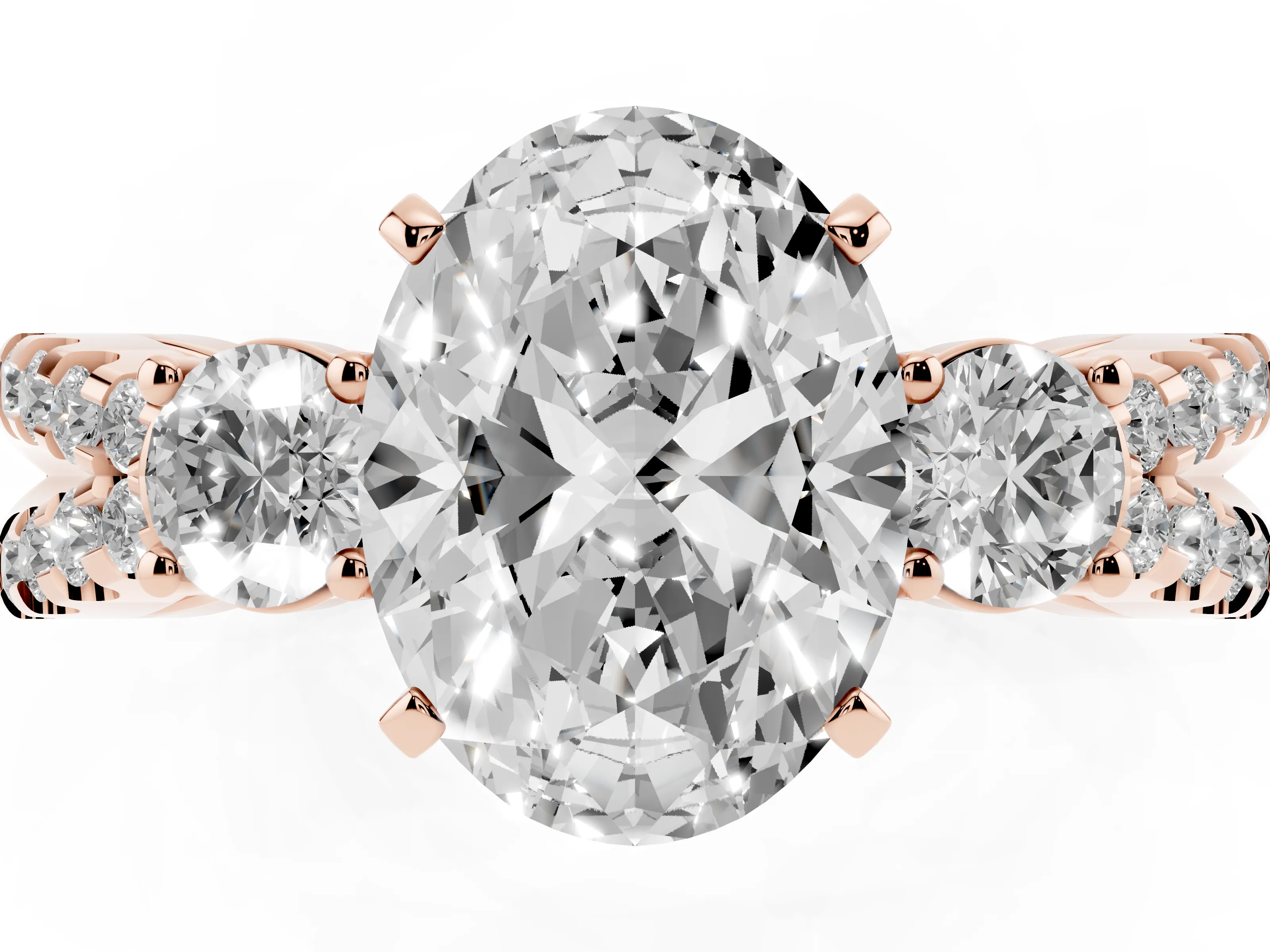 Oval Cut Diamond Three-Stone Ring Set in Rose gold with Pavé Split Shank and Prong Setting