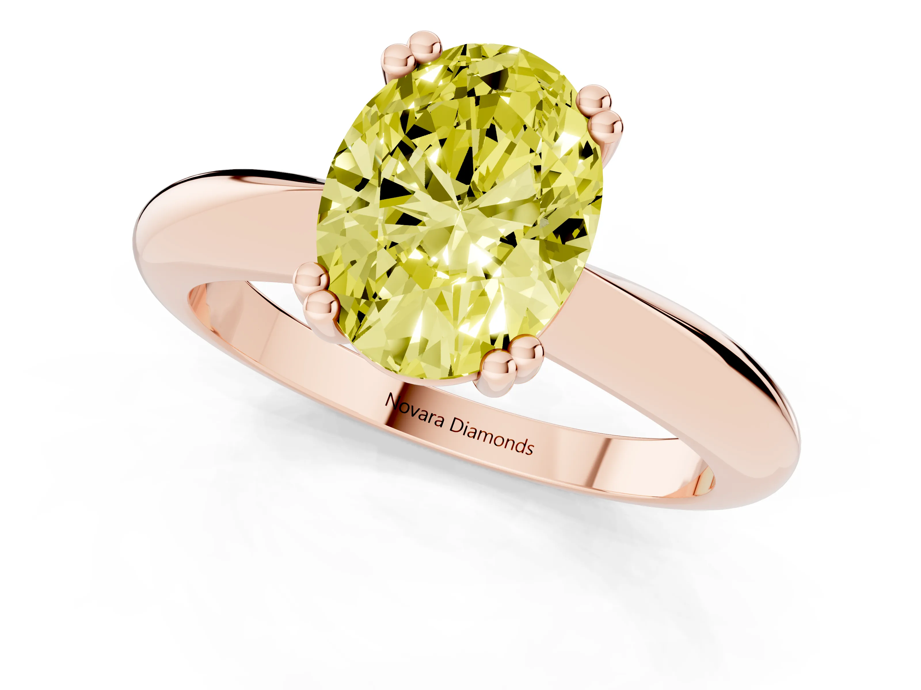Fancy Yellow Oval Cut Diamond Solitaire Engagement Ring Set in Rose gold with Tapered Band and Prong Setting