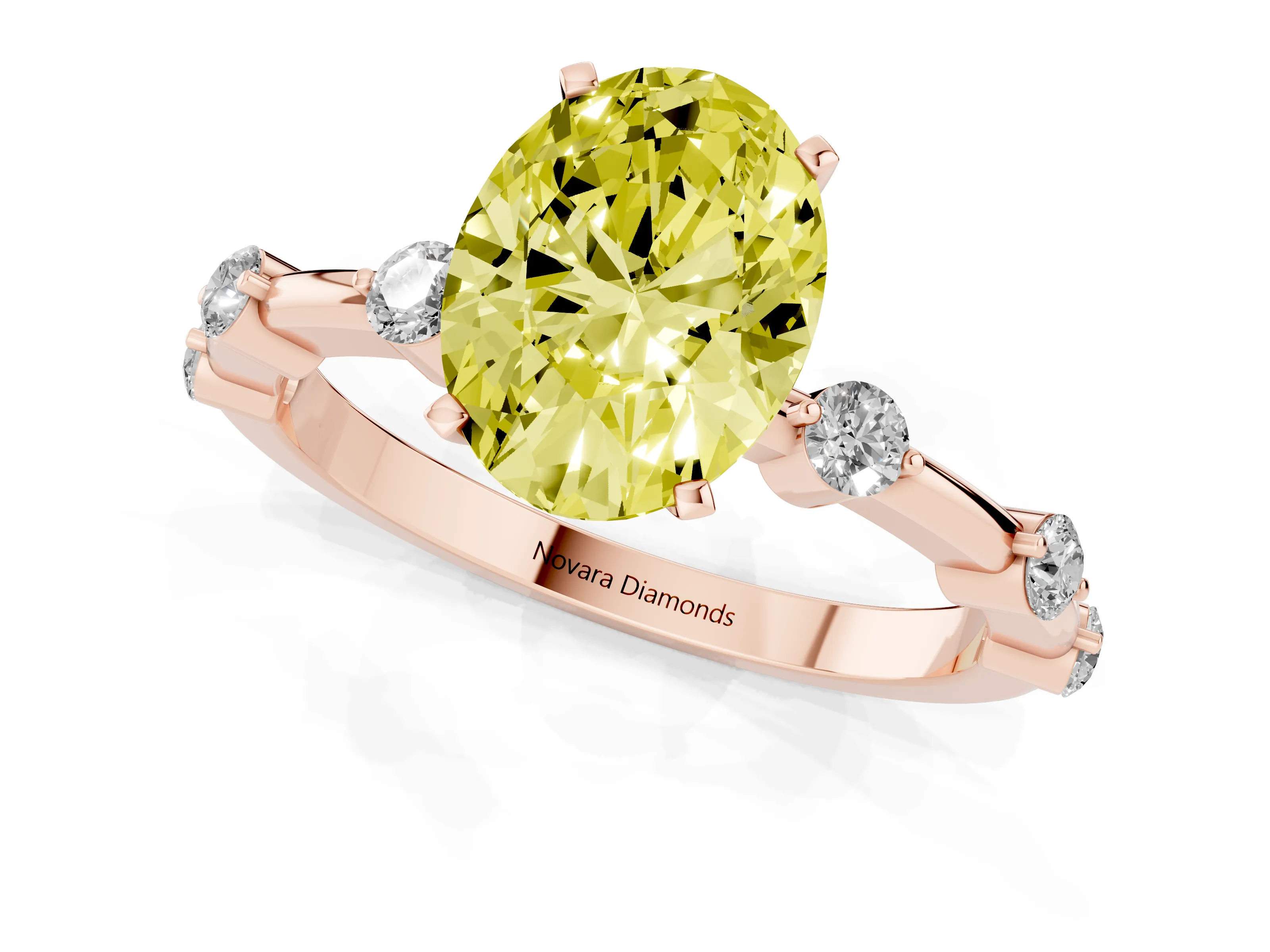 Fancy Yellow Oval Cut Diamond Solitaire Ring Set in Rose gold with Bezel Set Side Stones and Prong Setting