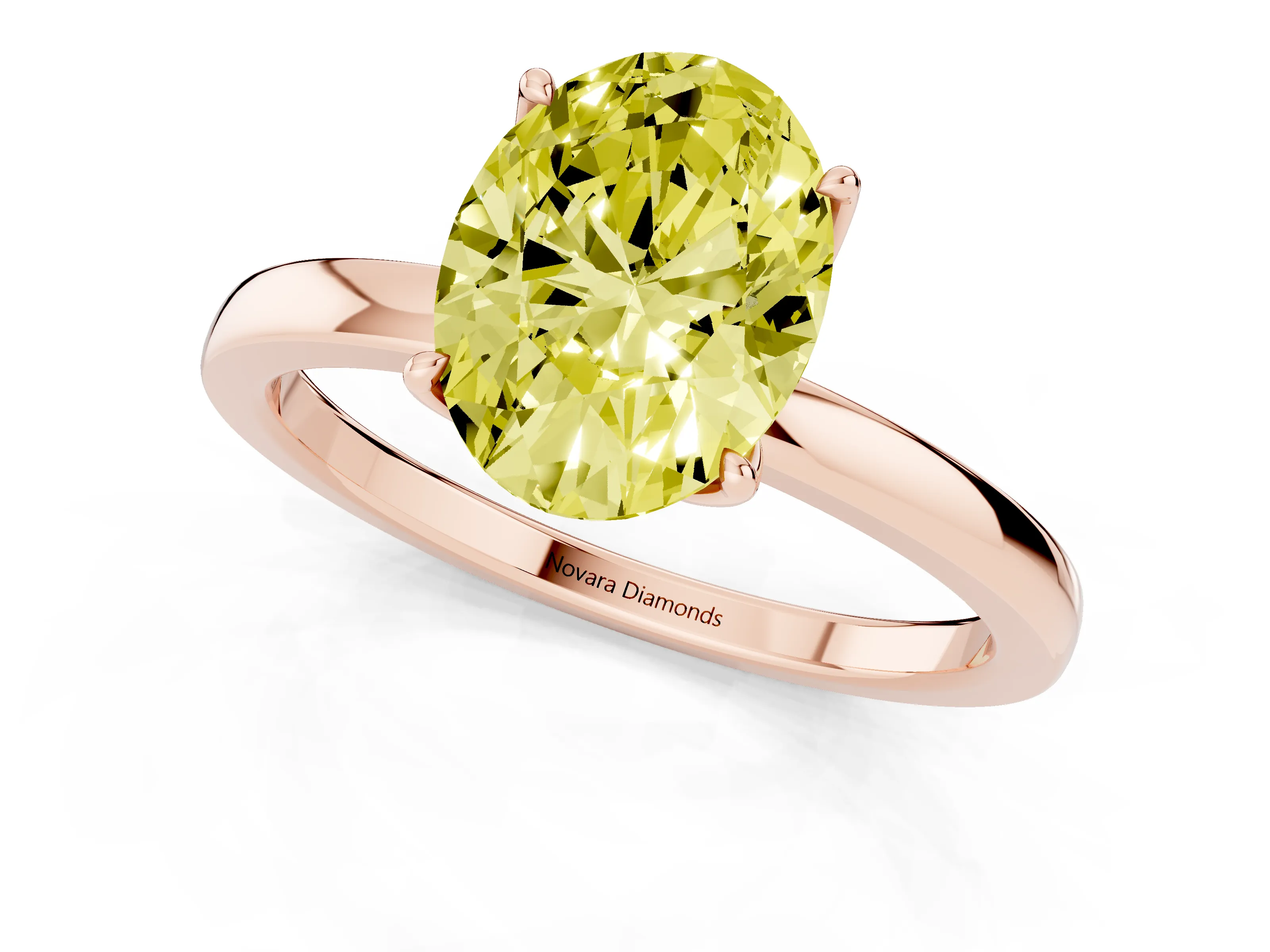 Fancy Yellow Oval Cut Diamond Solitaire Ring Set in Rose gold with Prong Setting and Thin Polished Band