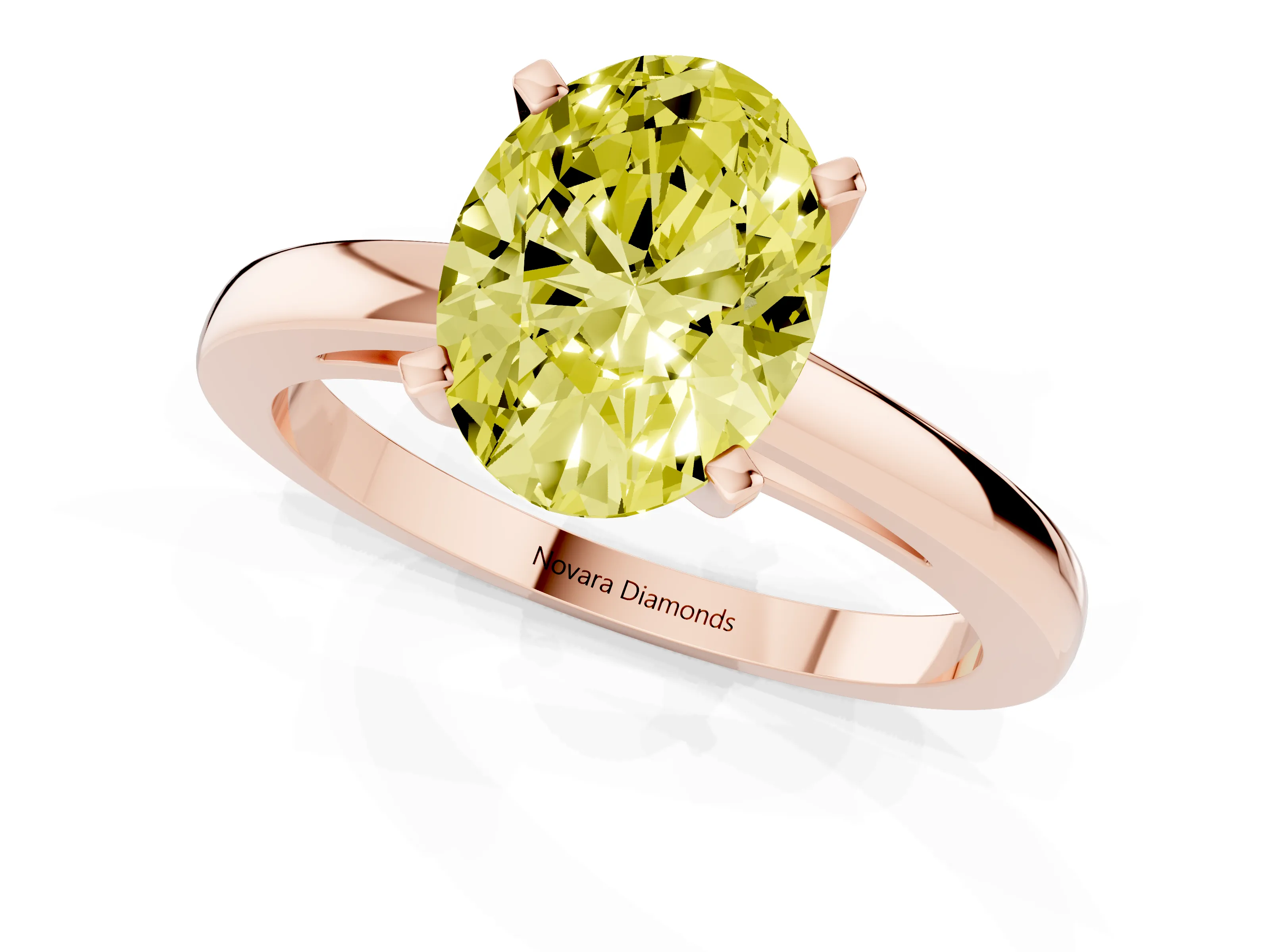 Fancy Yellow Oval Cut Diamond Solitaire Engagement Ring Set in Rose gold with Prong Setting on a Classic Band