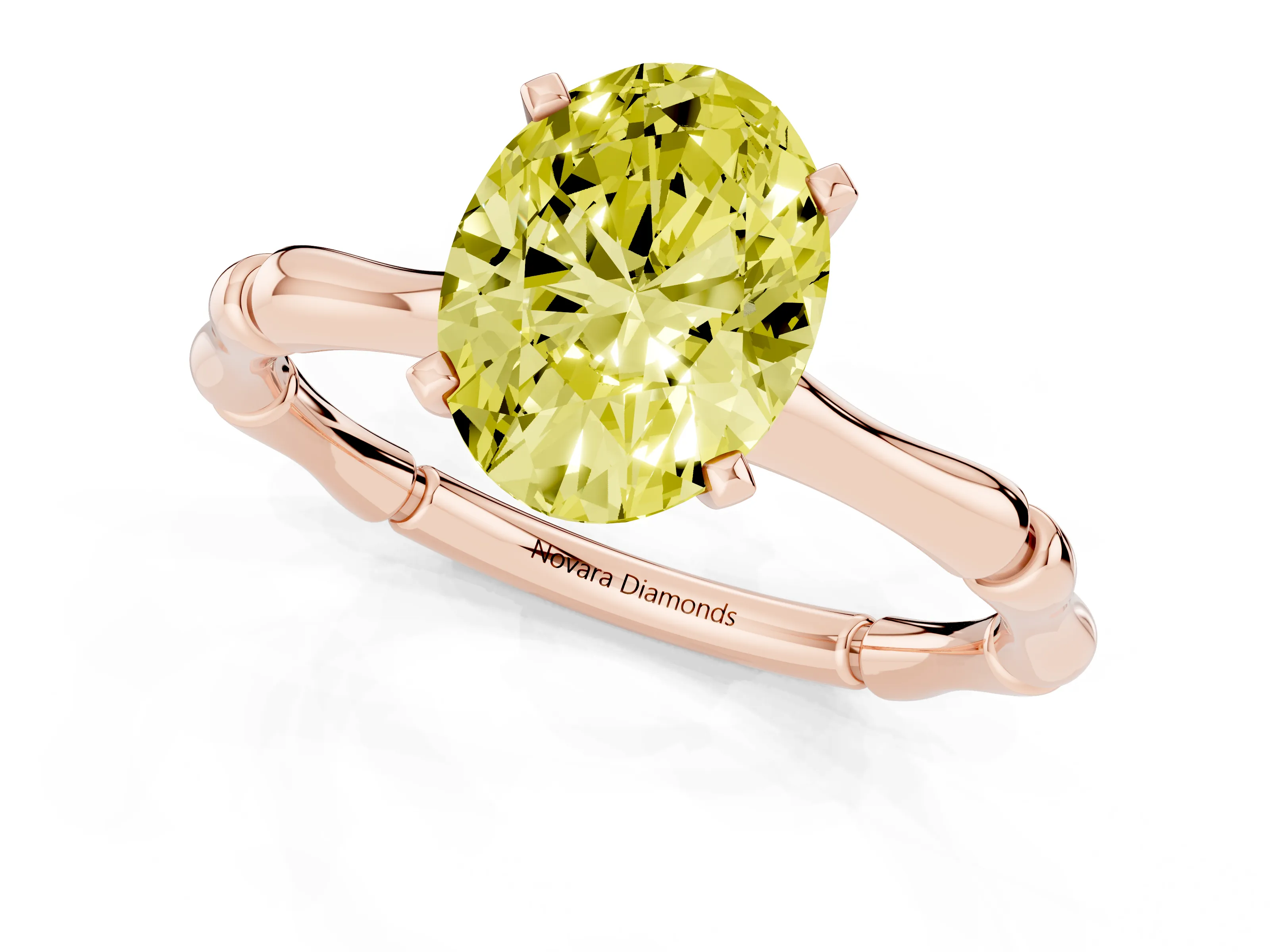 Fancy Yellow Oval Cut Diamond Solitaire Ring Set in Rose gold with Bamboo Band and Prong Setting