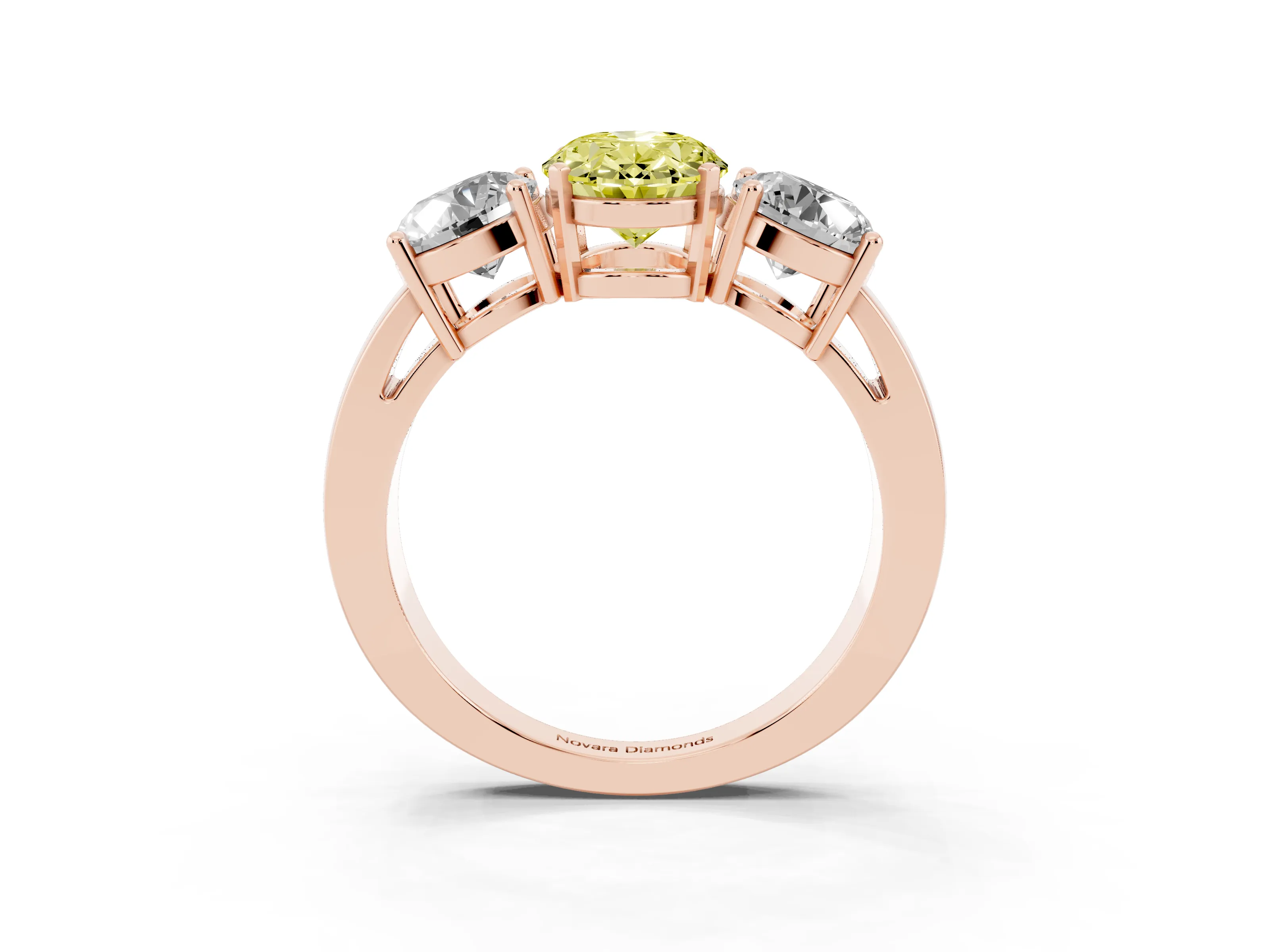 Fancy Yellow Oval Cut Diamond Three-Stone Ring Set in Rose gold with Round Side Stones and Classic Band