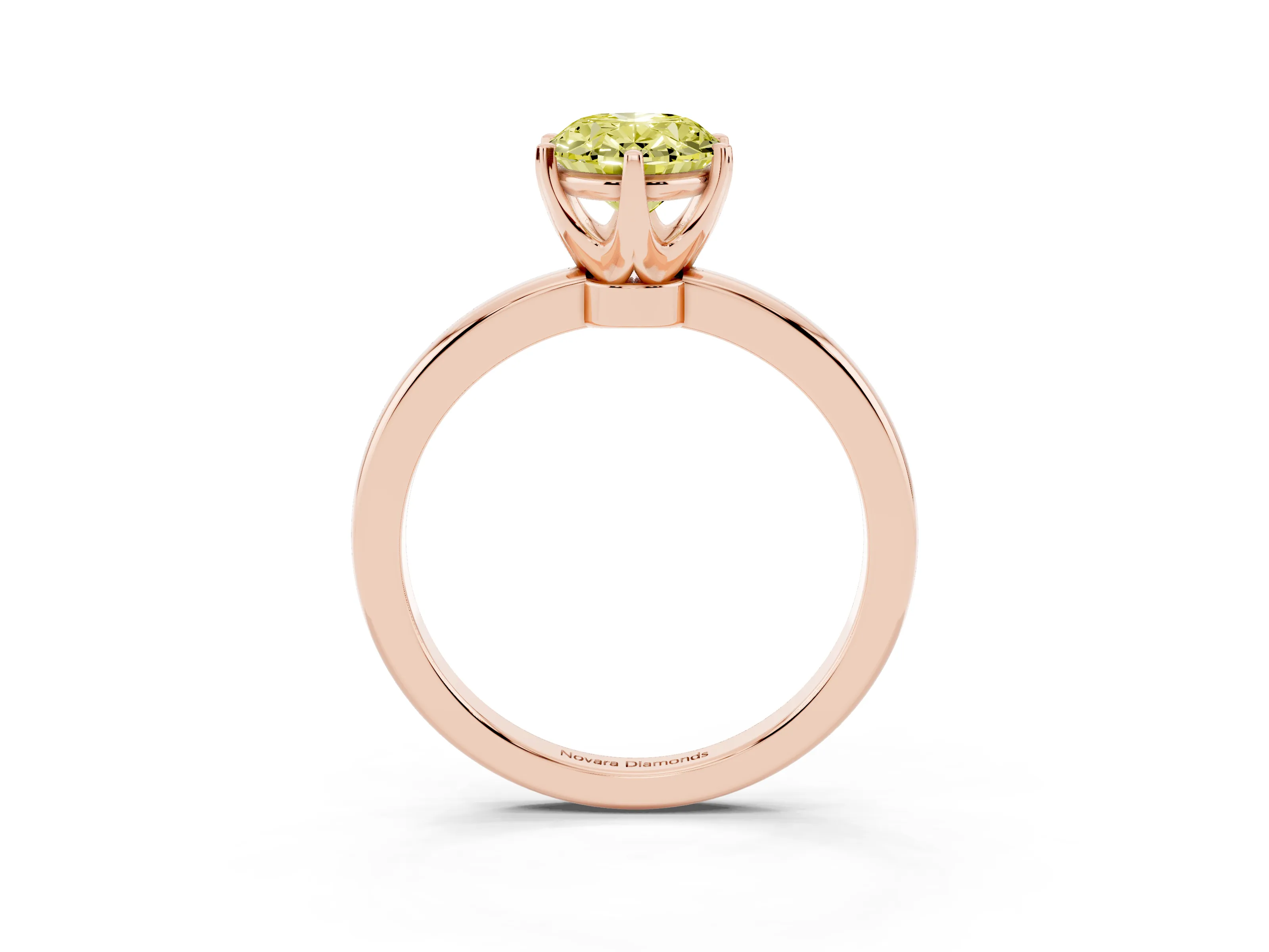 Fancy Yellow Oval Cut Diamond Solitaire Ring Set in Rose gold with Raised Prong Setting on a Classic Band