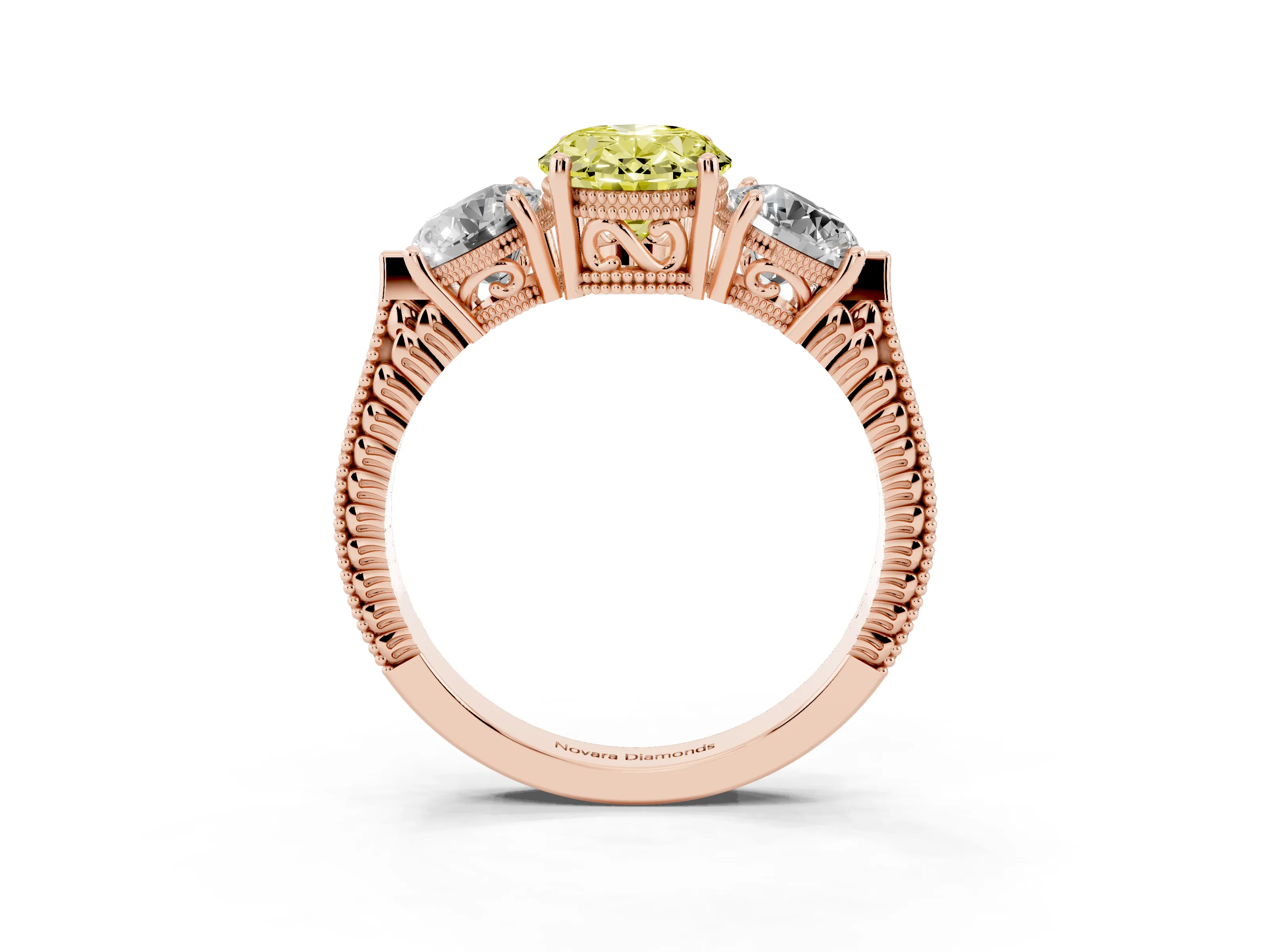Fancy Yellow Oval Cut Diamond Three-Stone Ring Set in Rose gold with Milgrain Band
