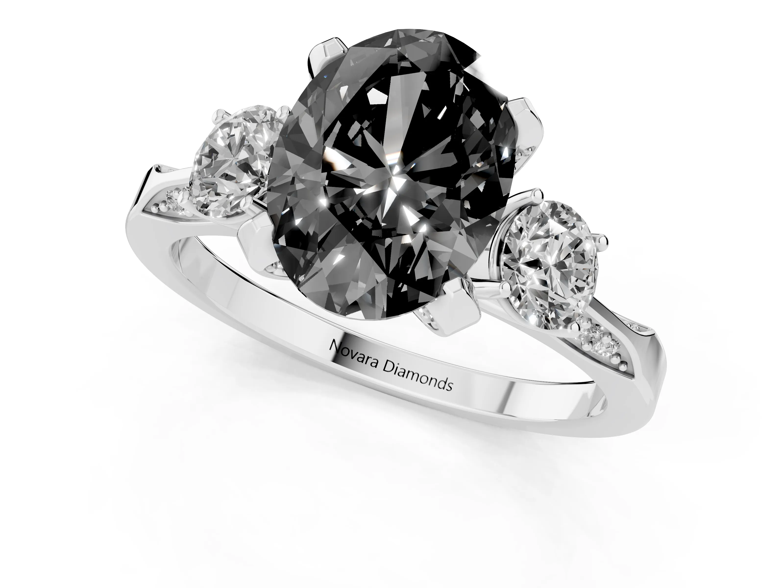 Fancy Black Oval Cut Diamond Three-Stone Ring Set in Platinum with Pavé Band and Smaller Side Stones