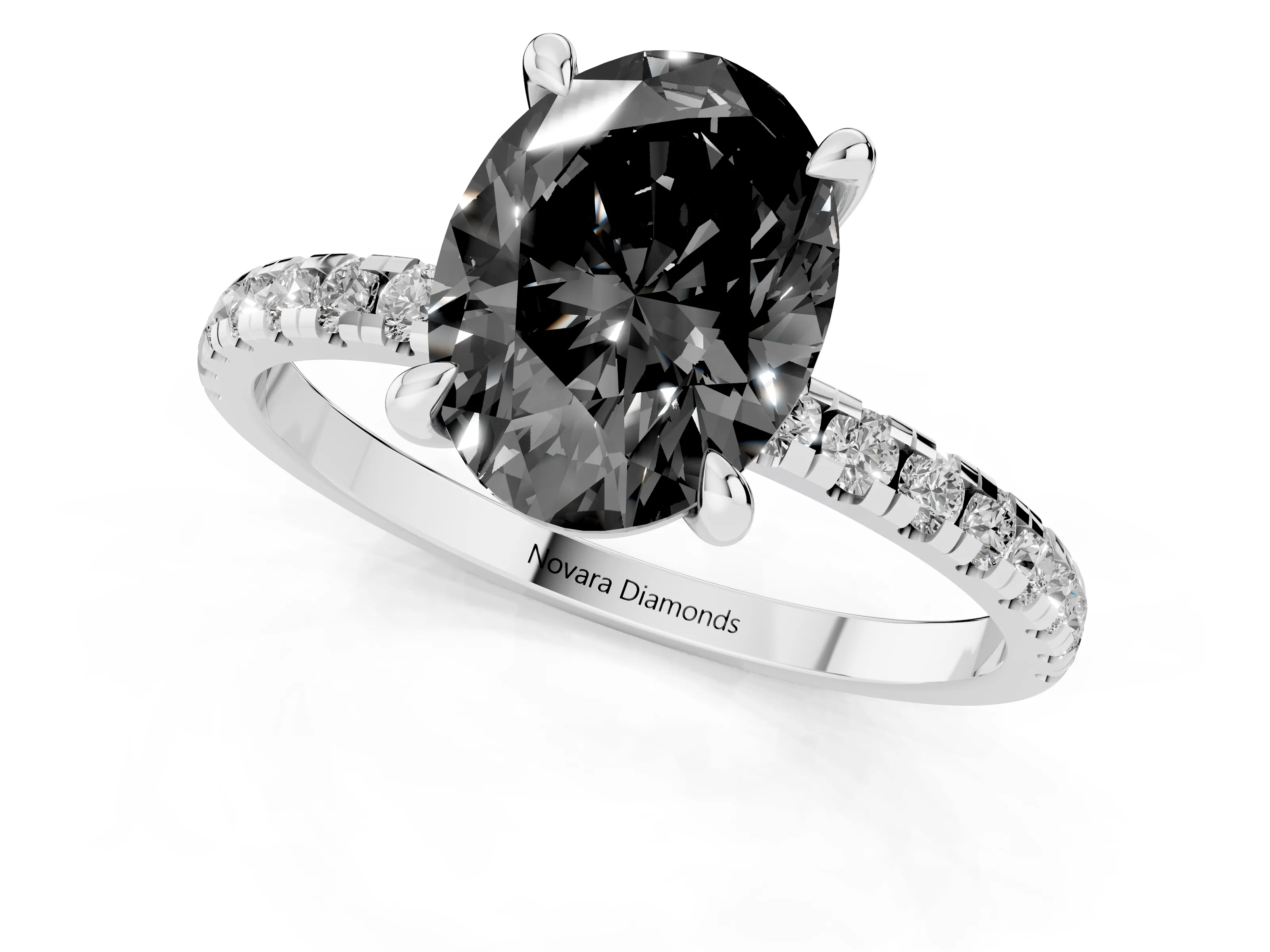 Fancy Black Oval Cut Diamond Brilliant Solitaire Ring Set in White gold with Pavé Band and Prong Setting