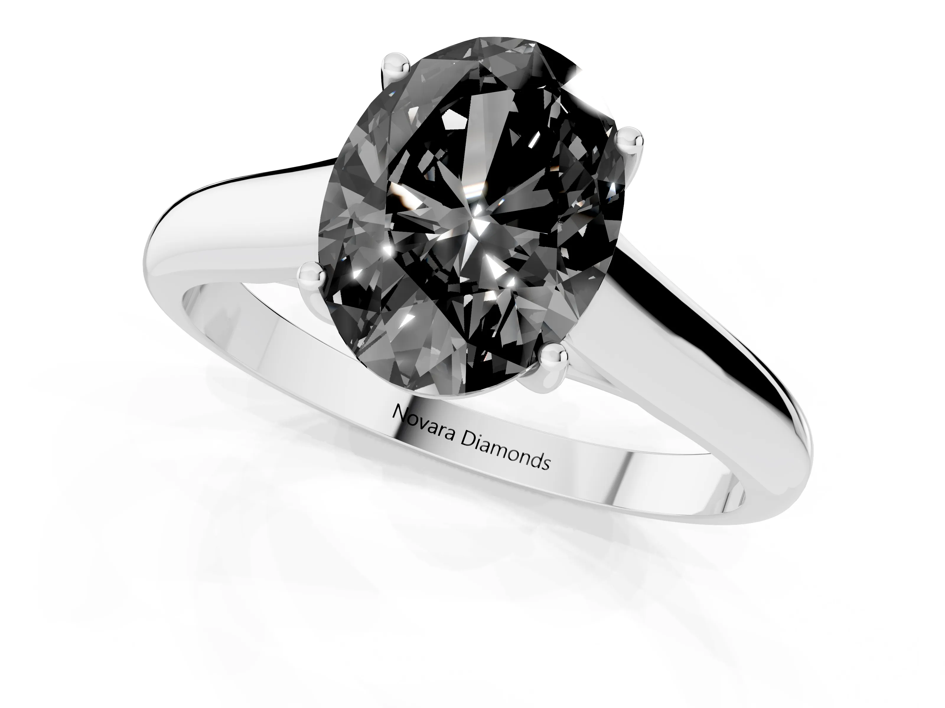 Fancy Black Oval Cut Diamond Solitaire Engagement Ring Set in White gold with Subtly Tapered Band and Prong Setting