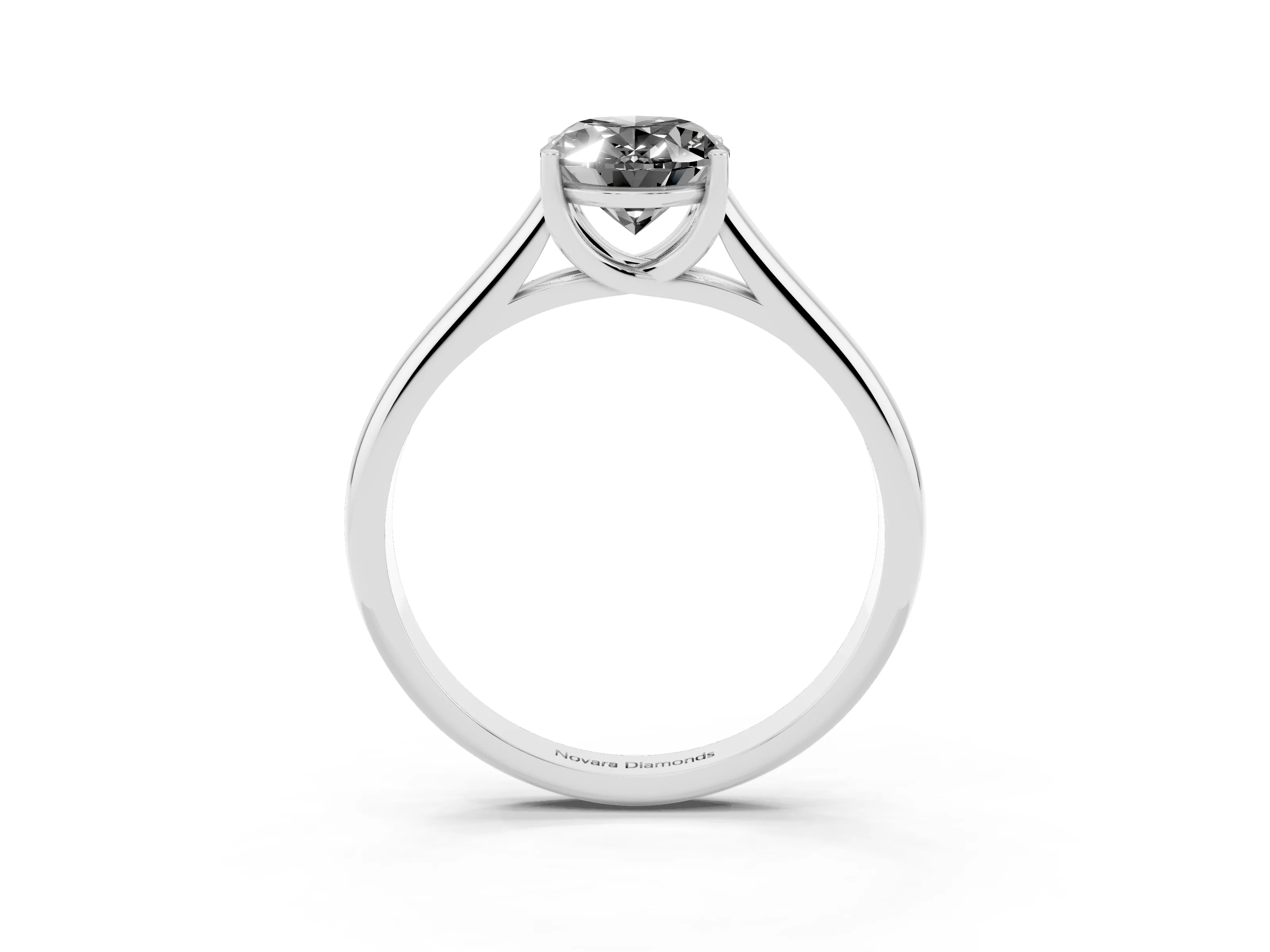 Fancy Black Oval Cut Diamond Solitaire Engagement Ring Set in White gold with Subtly Tapered Band and Prong Setting