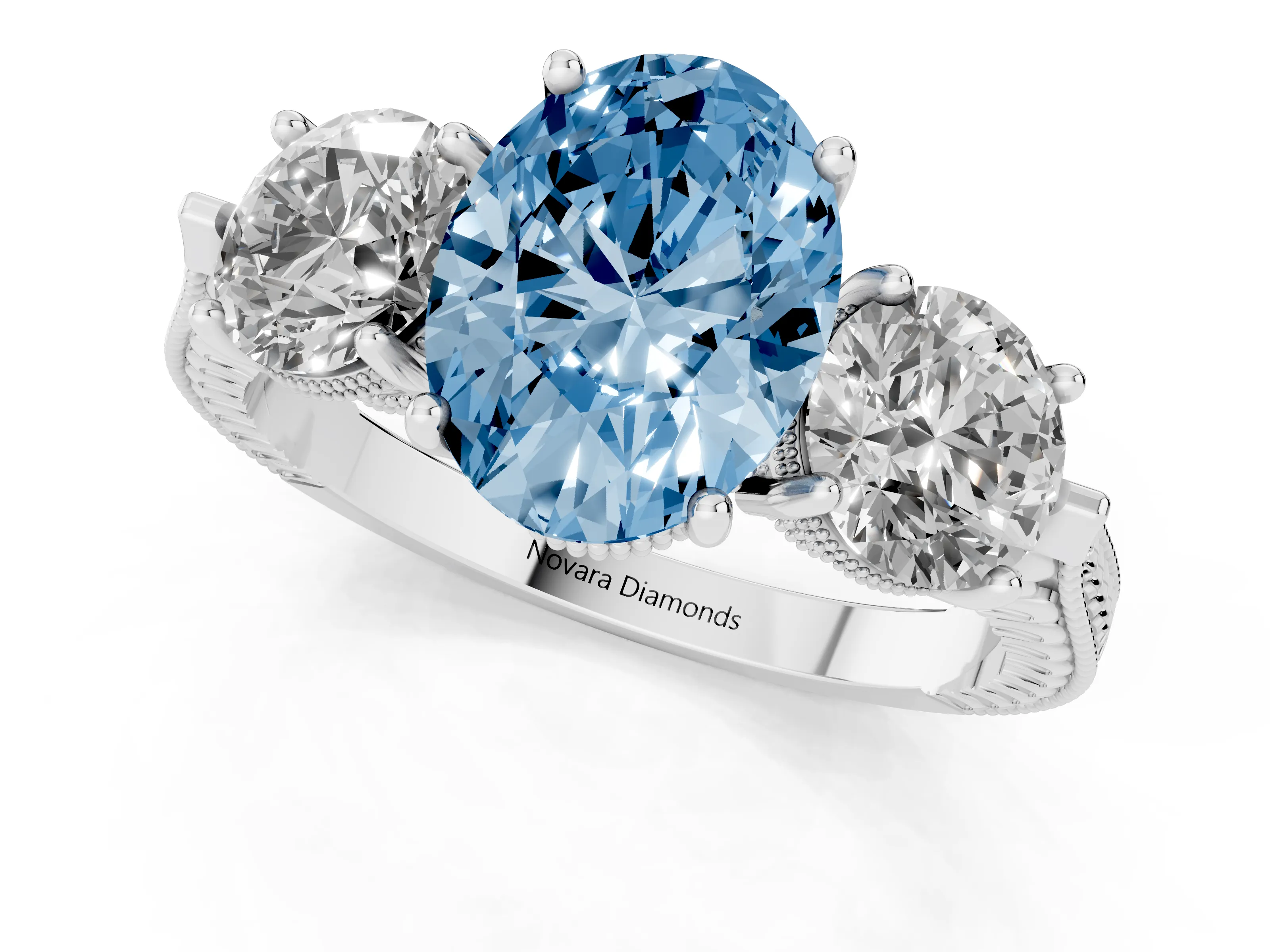 Fancy Blue Oval Cut Diamond Three-Stone Ring Set in Silver with Milgrain Band