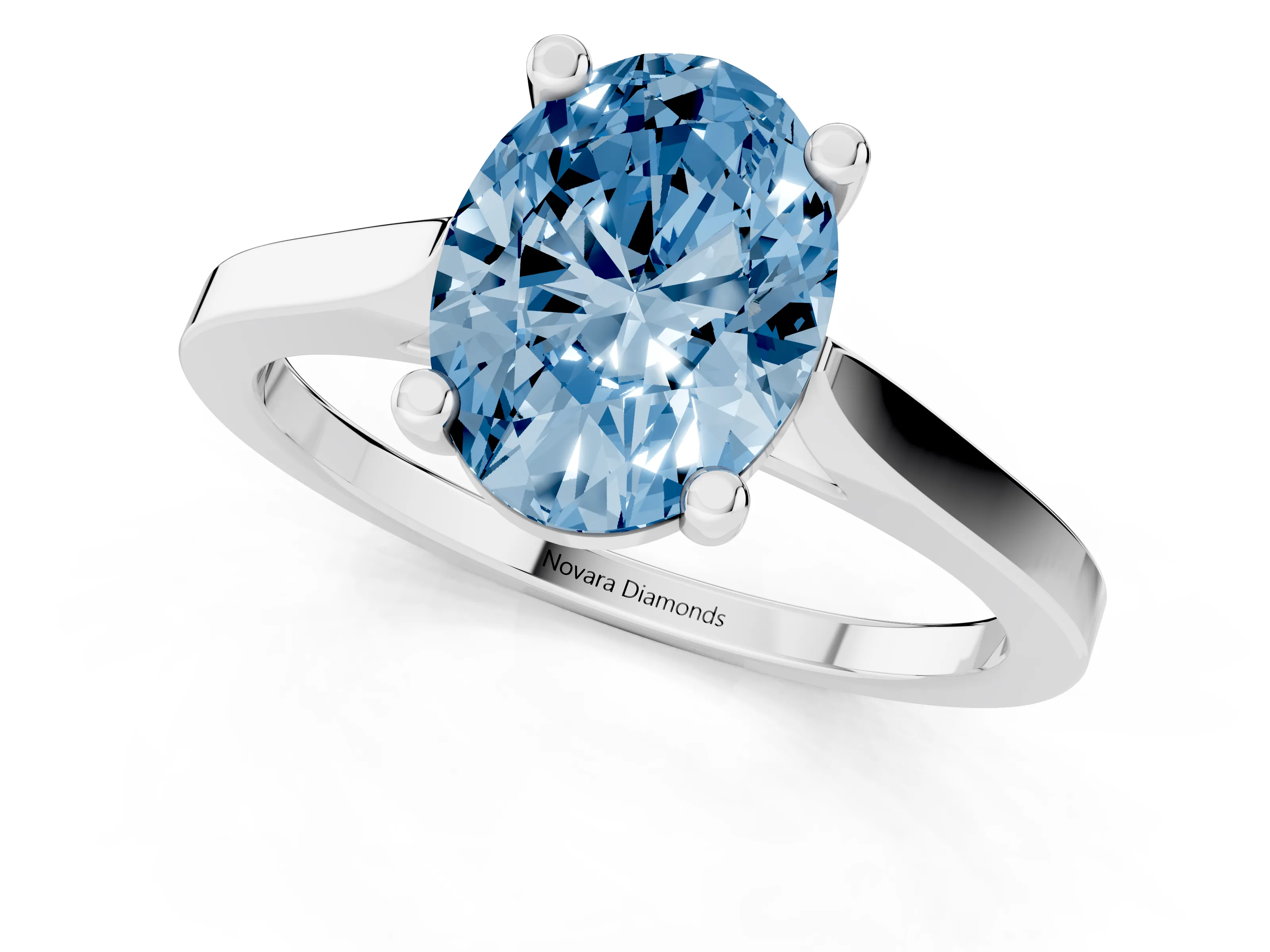 Fancy Blue Oval Cut Diamond Solitaire Ring Set in Silver with Prong Setting and Tapered Band