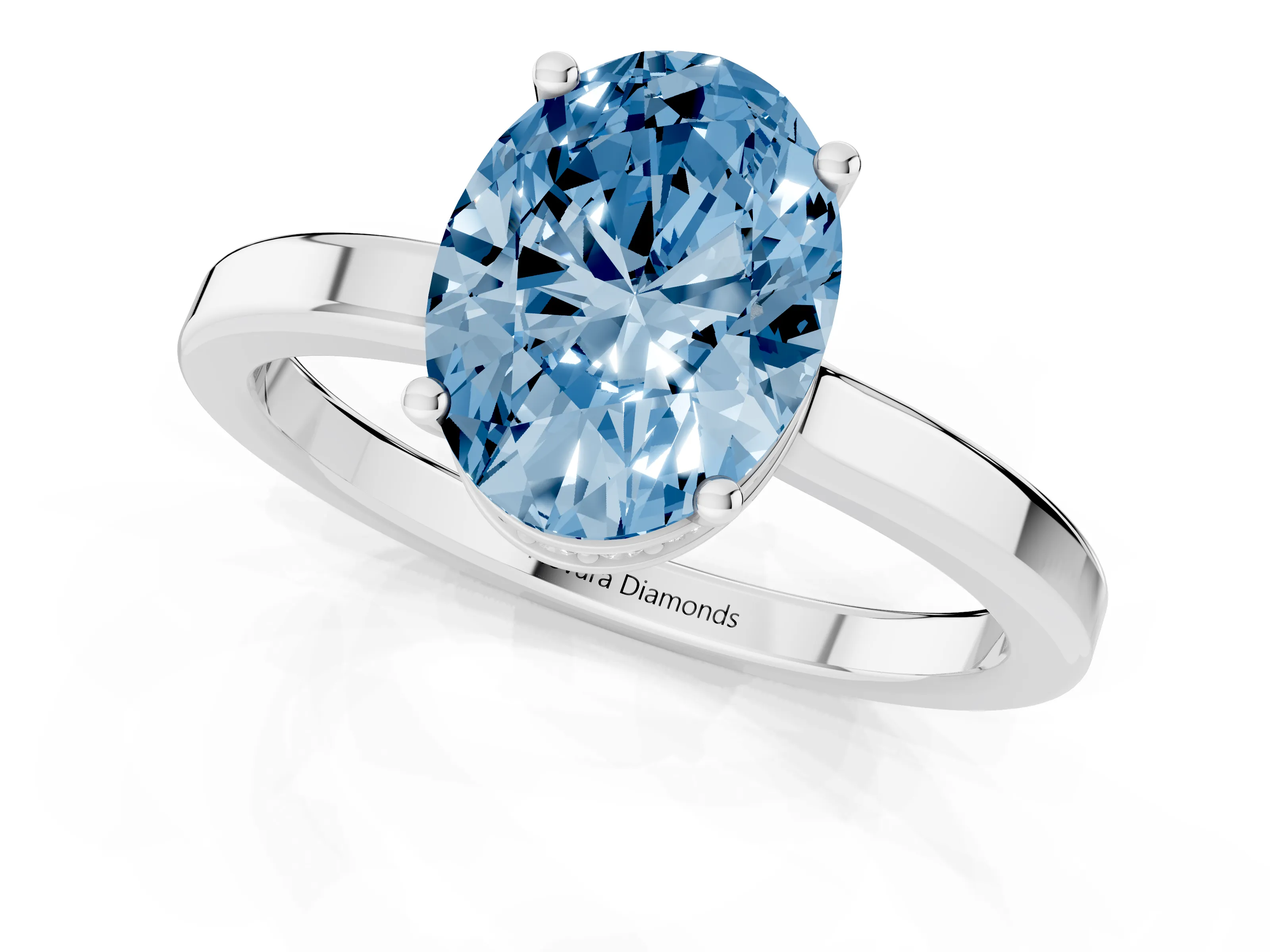 Fancy Blue Oval Cut Diamond Solitaire Engagement Ring Set in Silver with Prong Setting on a Plain Band