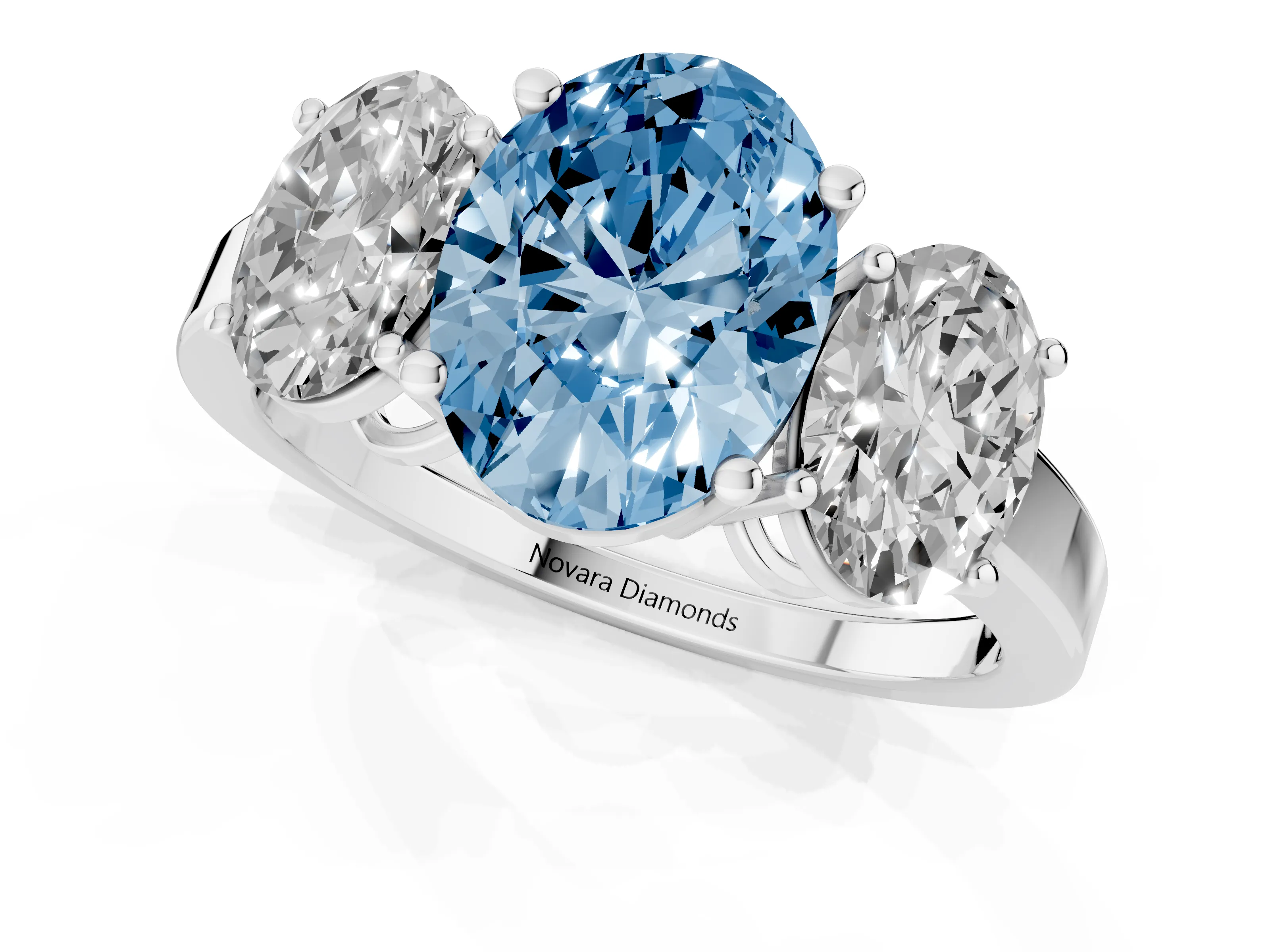 Fancy Blue Oval Cut Diamond Three-Stone Engagement Ring Set in Platinum with Flat Band