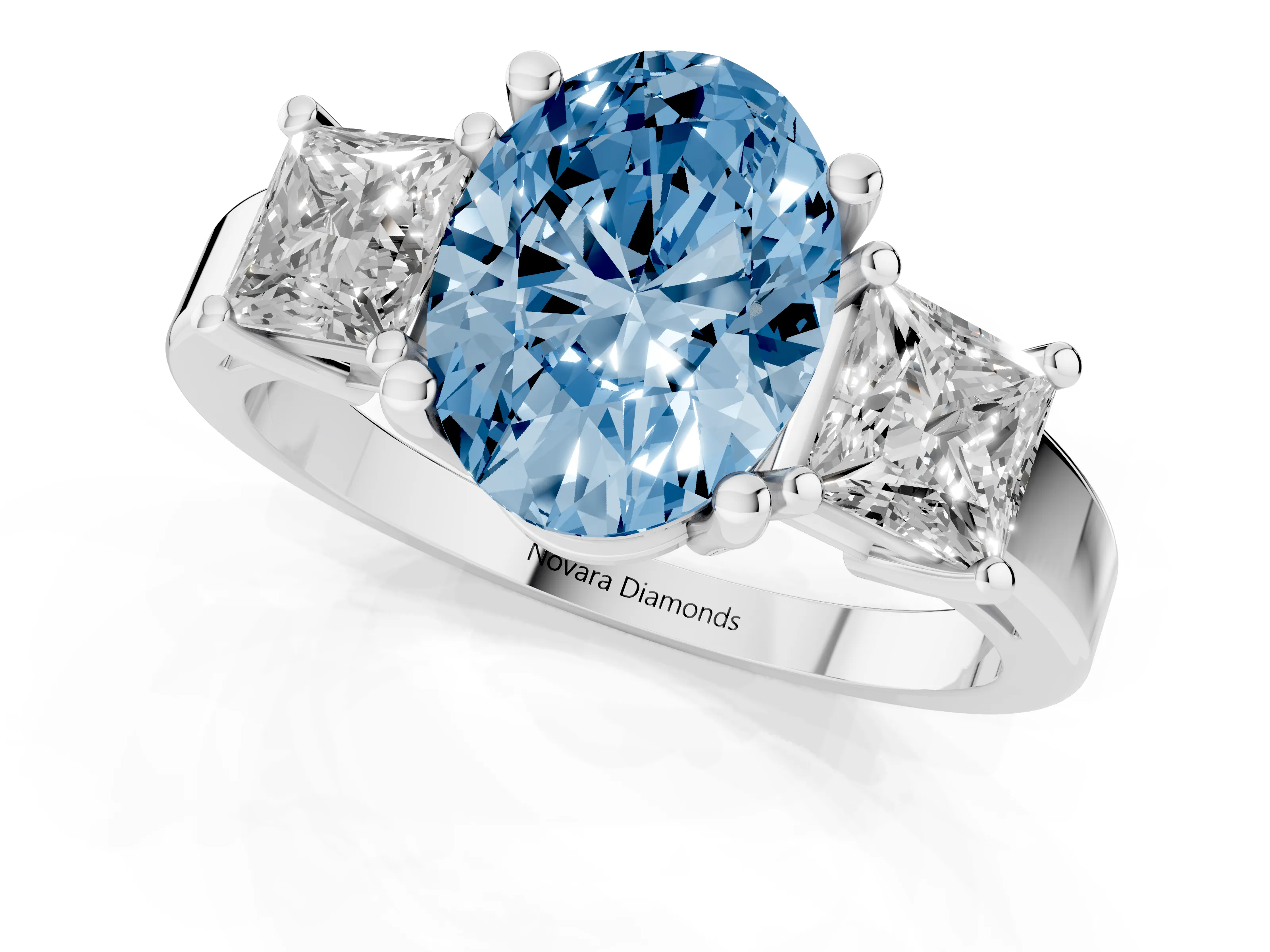 Fancy Blue Three-Stone Oval Cut Diamond Solitaire Ring Set in Platinum with Prong Setting