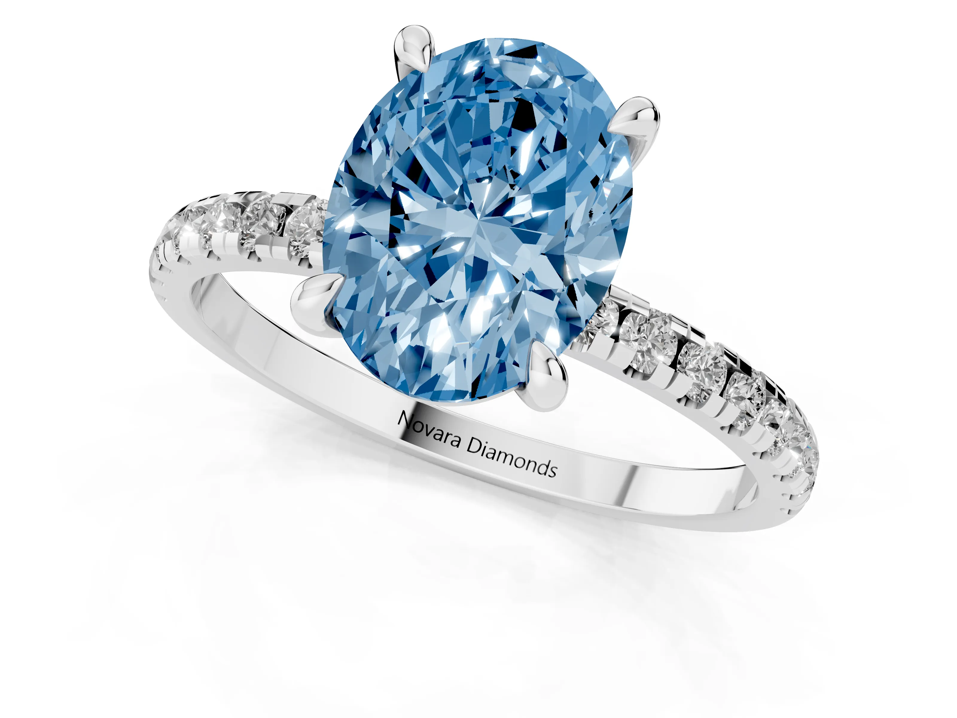 Fancy Blue Oval Cut Diamond Brilliant Solitaire Ring Set in White gold with Pavé Band and Prong Setting