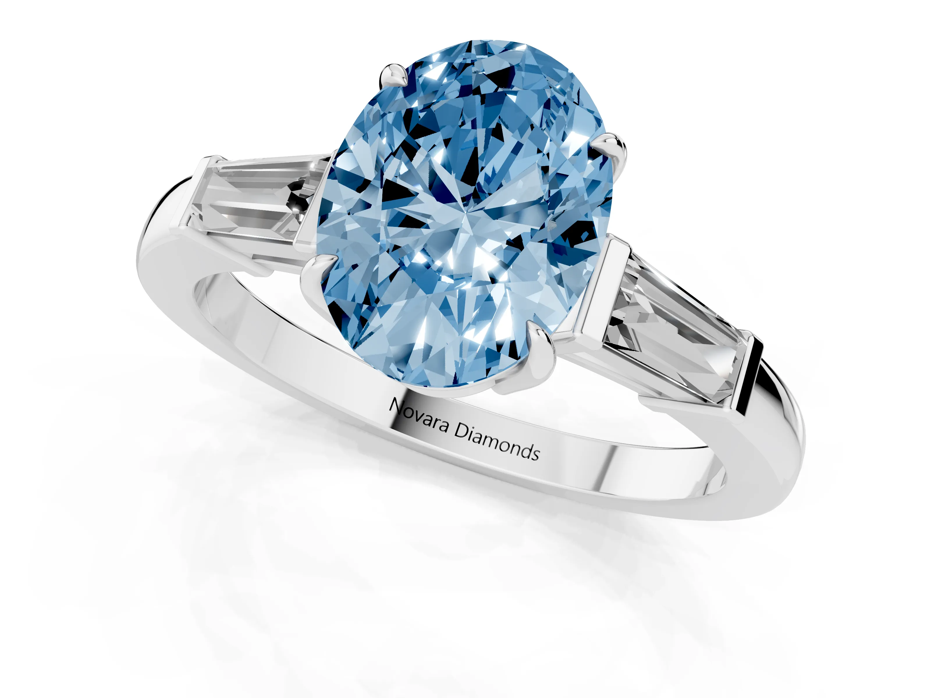 Fancy Blue Oval Cut Diamond Three-Stone Ring Set in Silver with Tapered Baguette Side Stones and Prong Setting