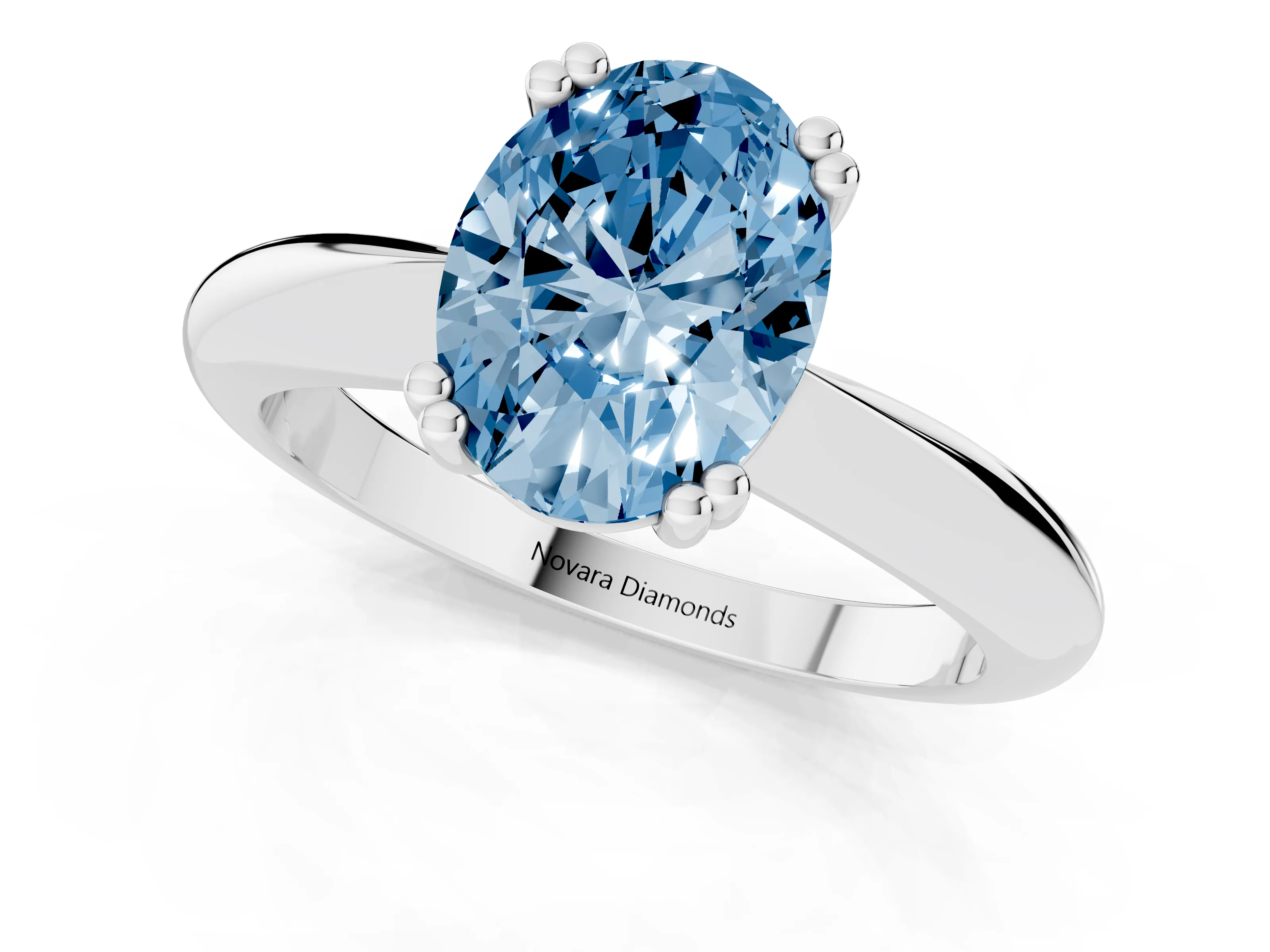 Fancy Blue Oval Cut Diamond Solitaire Engagement Ring Set in Silver with Tapered Band and Prong Setting