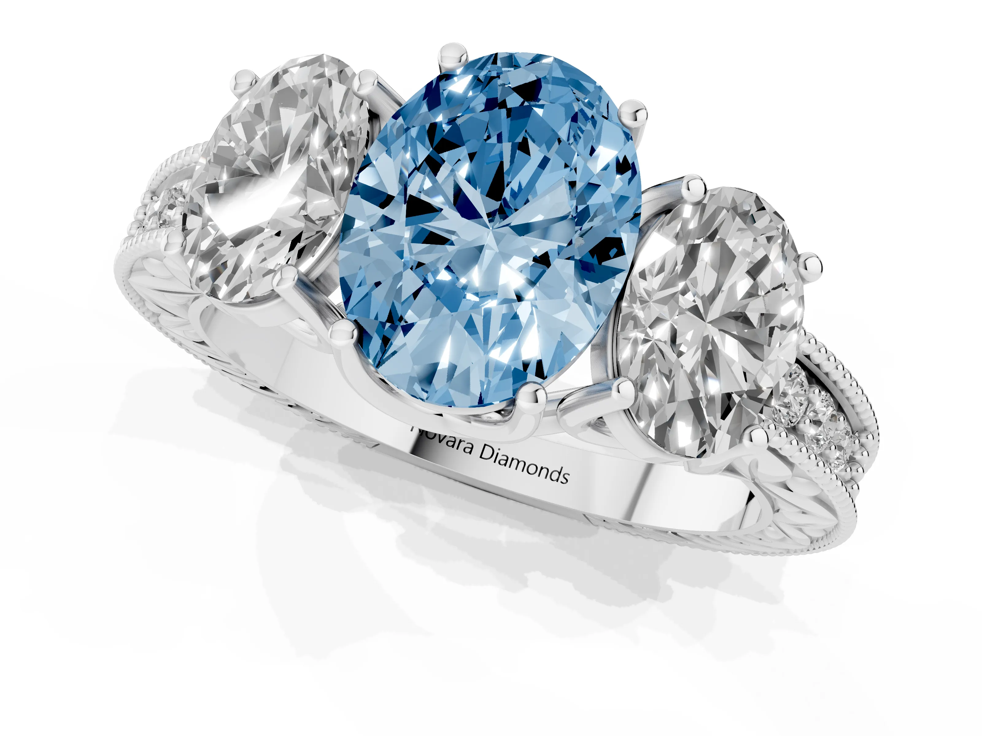 Fancy Blue Oval Cut Diamond Three-Stone Engagement Ring Set in White gold with Milgrain Pavé Band