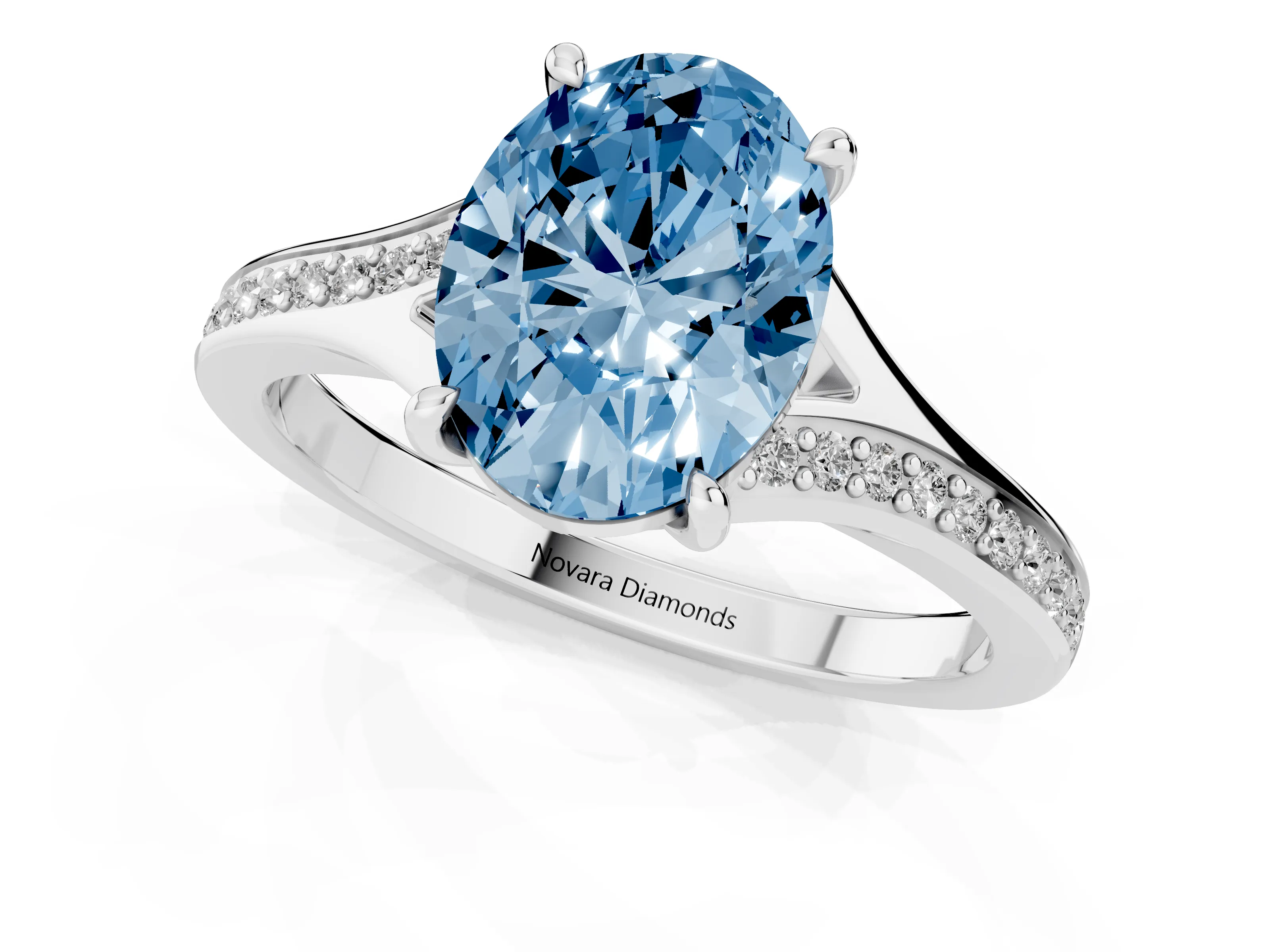 Fancy Blue Oval Cut Diamond Solitaire Ring Set in White gold with Pavé Accent Band and Classic Prong Setting