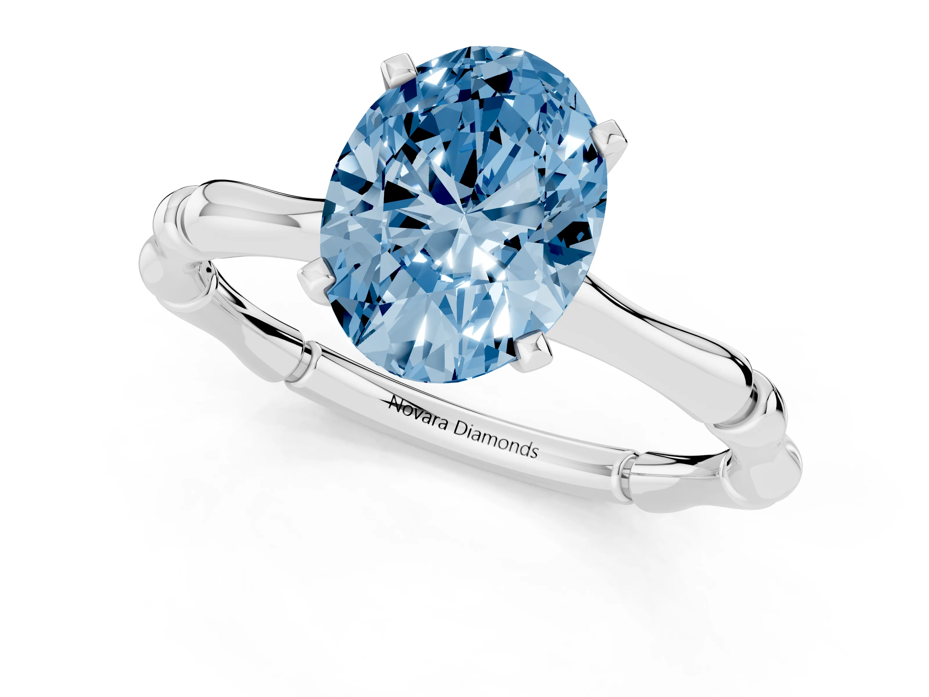 Fancy Blue Oval Cut Diamond Solitaire Ring Set in Silver with Bamboo Band and Prong Setting