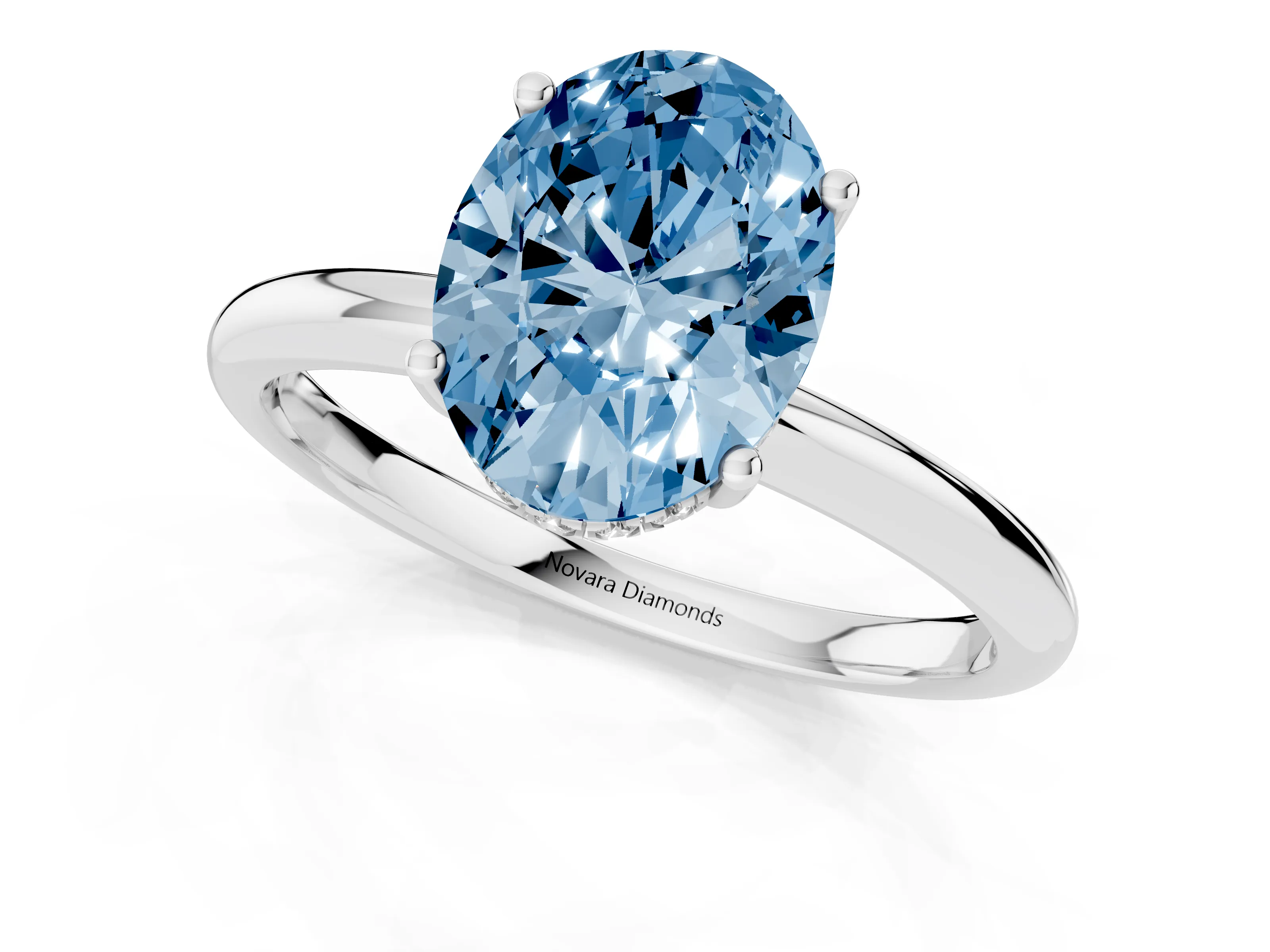Fancy Blue Oval Cut Diamond Solitaire Engagement Ring Set in Silver with Prong Setting and Polished Band