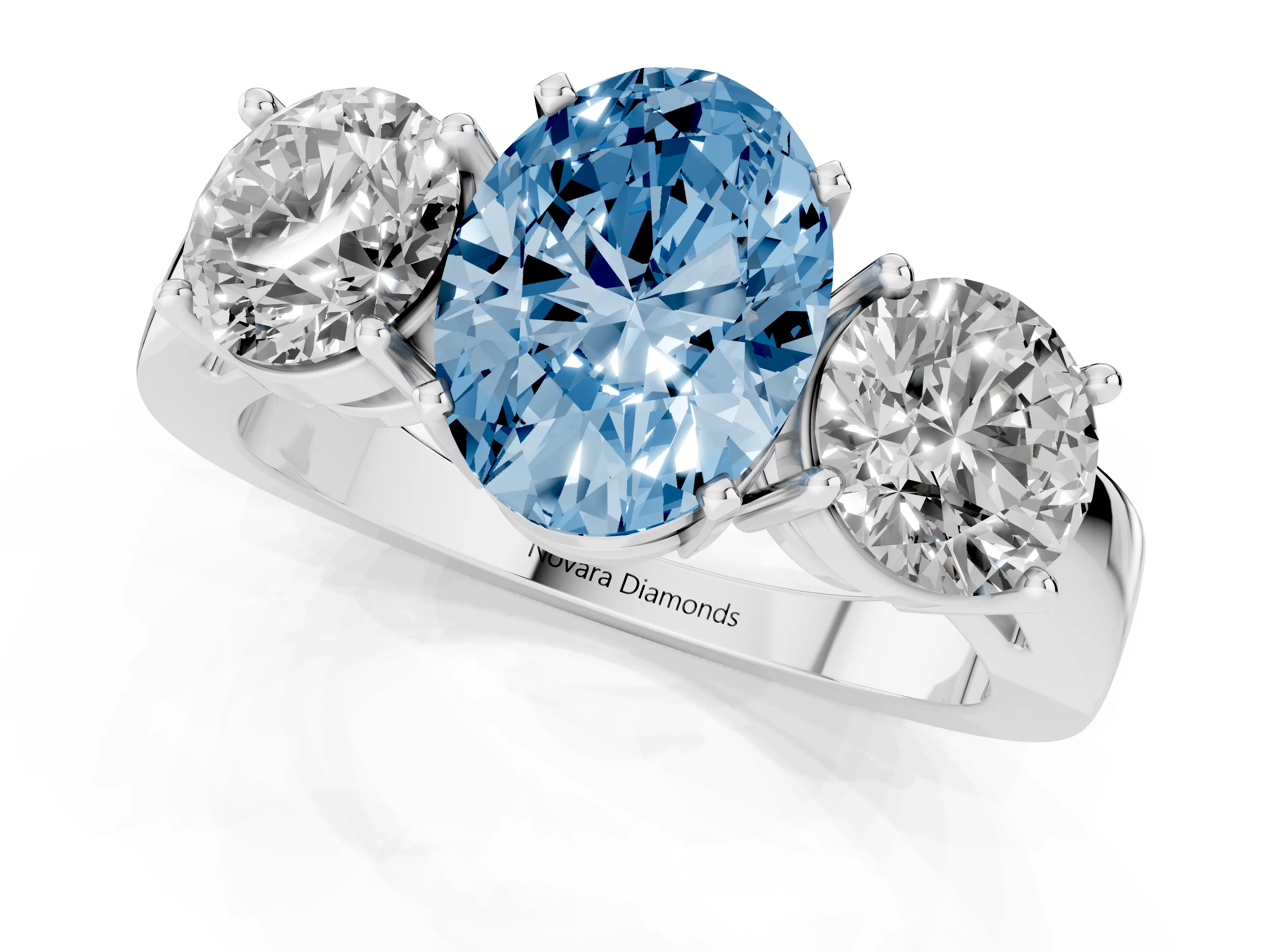 Fancy Blue Oval Cut Diamond Three-Stone Ring Set in Platinum with Round Side Stones and Classic Band