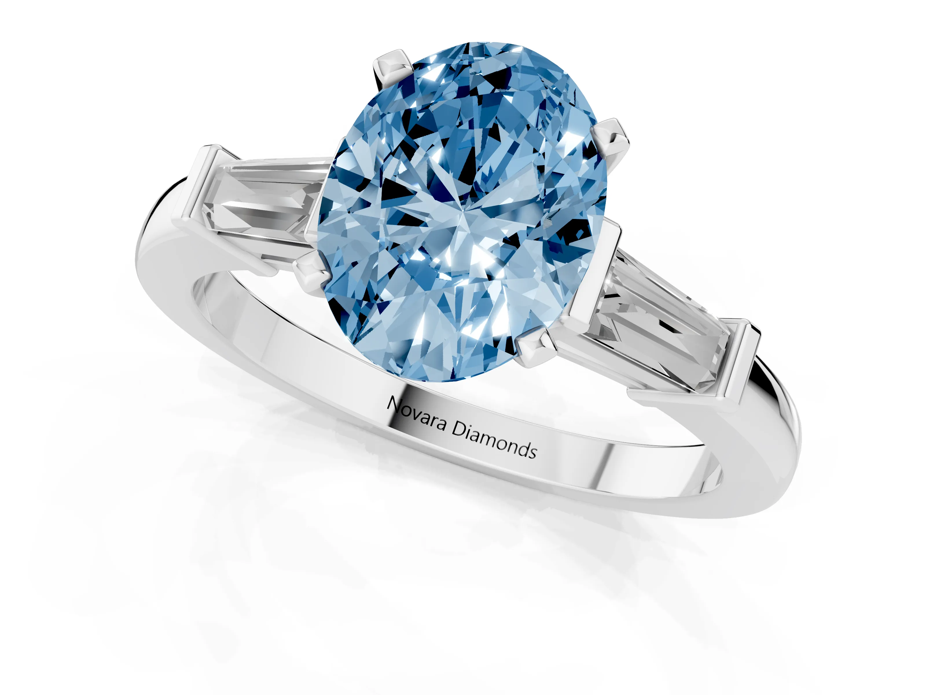 Fancy Blue Oval Cut Diamond Solitaire Ring Set in White gold with Tapered Baguette Accents and Prong Setting