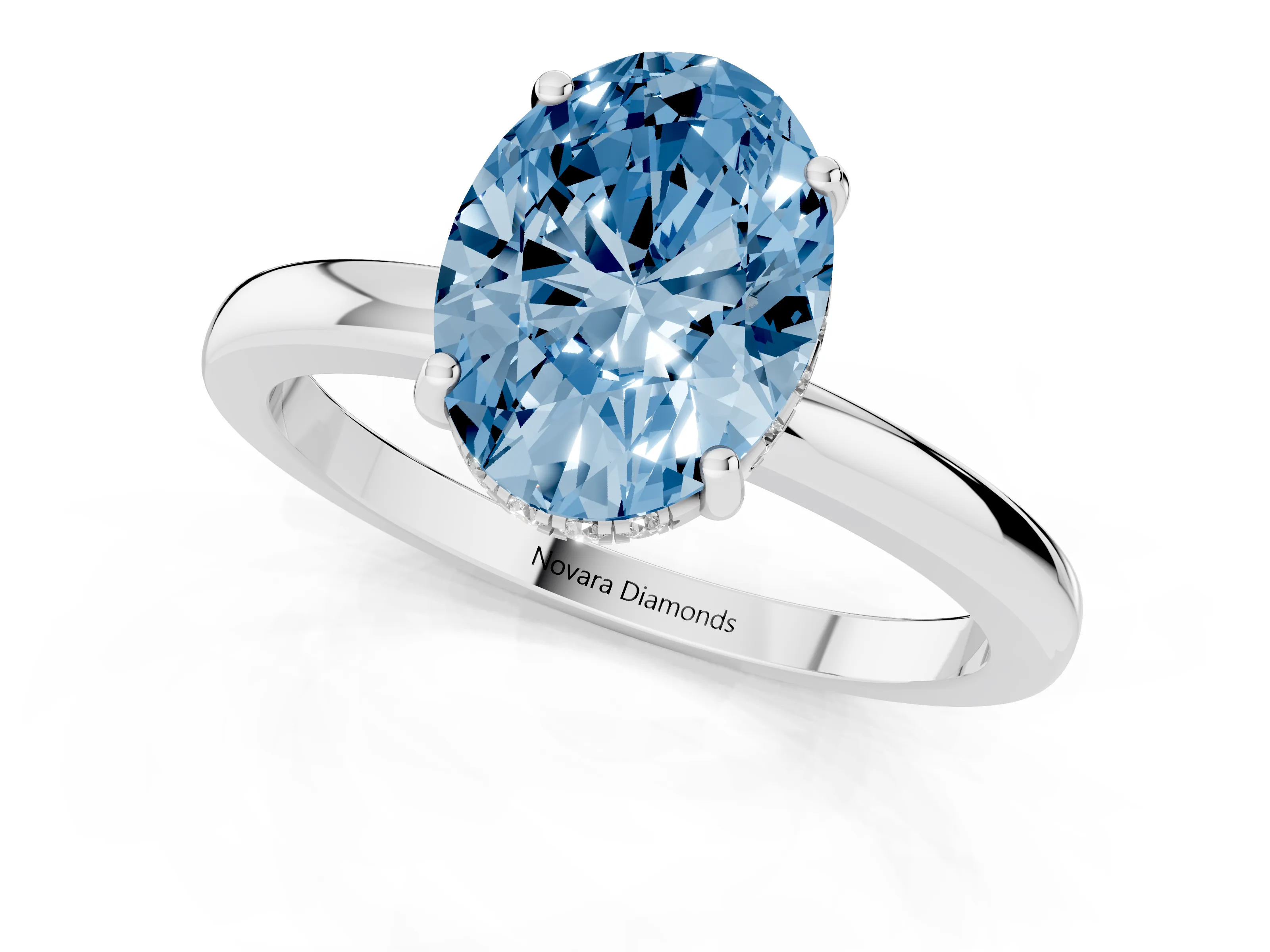 Fancy Blue Oval Cut Diamond Solitaire Ring Set in Platinum with Plain Band and Prong Setting