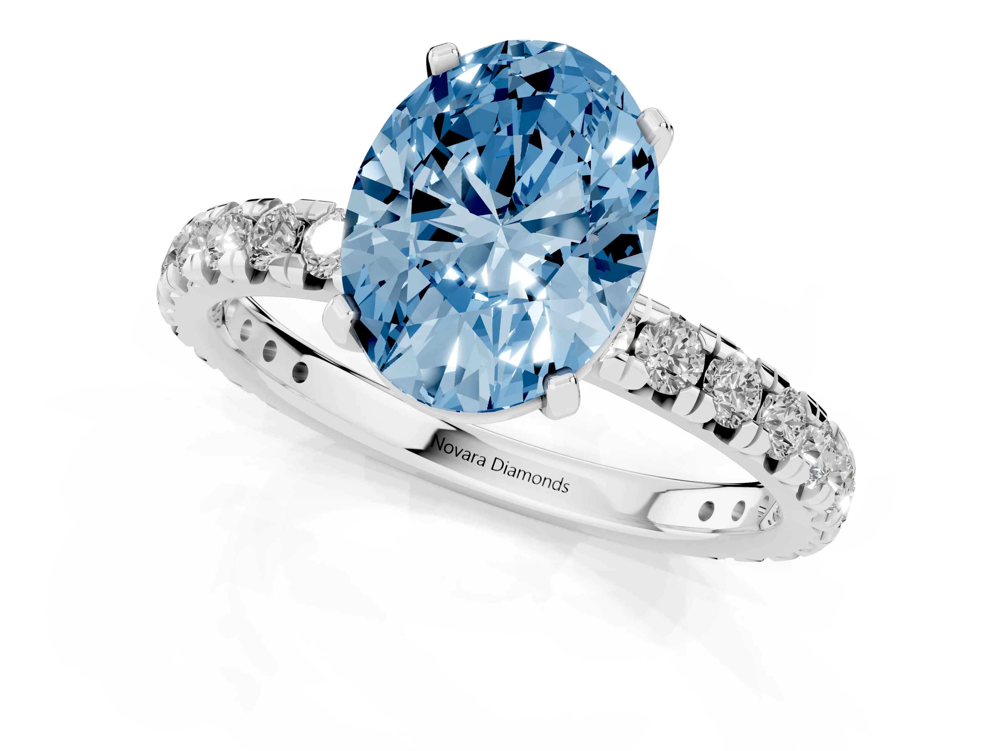 Fancy Blue Oval Cut Diamond Pavé Solitaire Ring Set in Silver with Round Band and Prong Setting