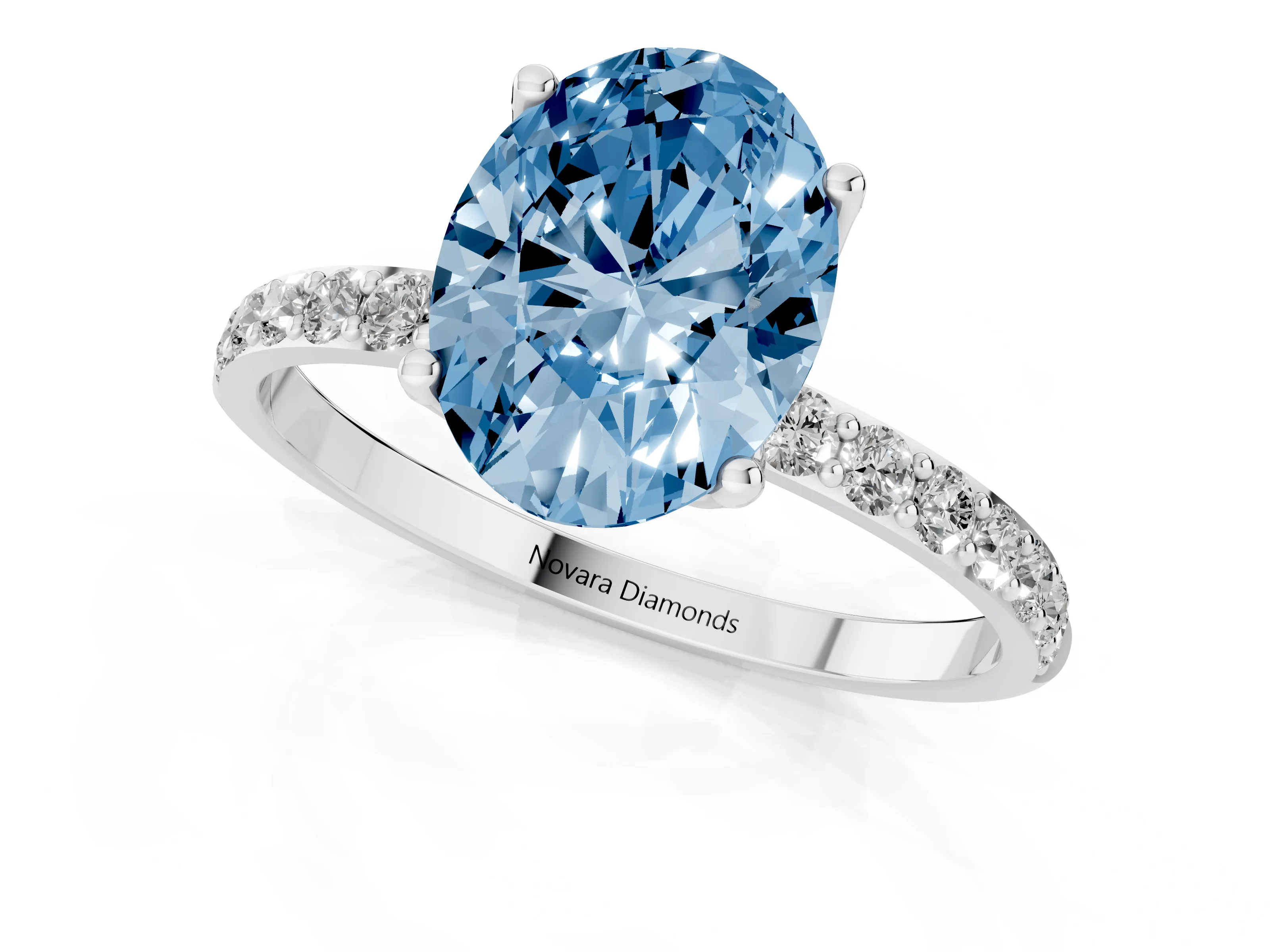 Fancy Blue Oval Cut Diamond Solitaire Engagement Ring Set in White gold with Round Pavé Band and Prong Setting