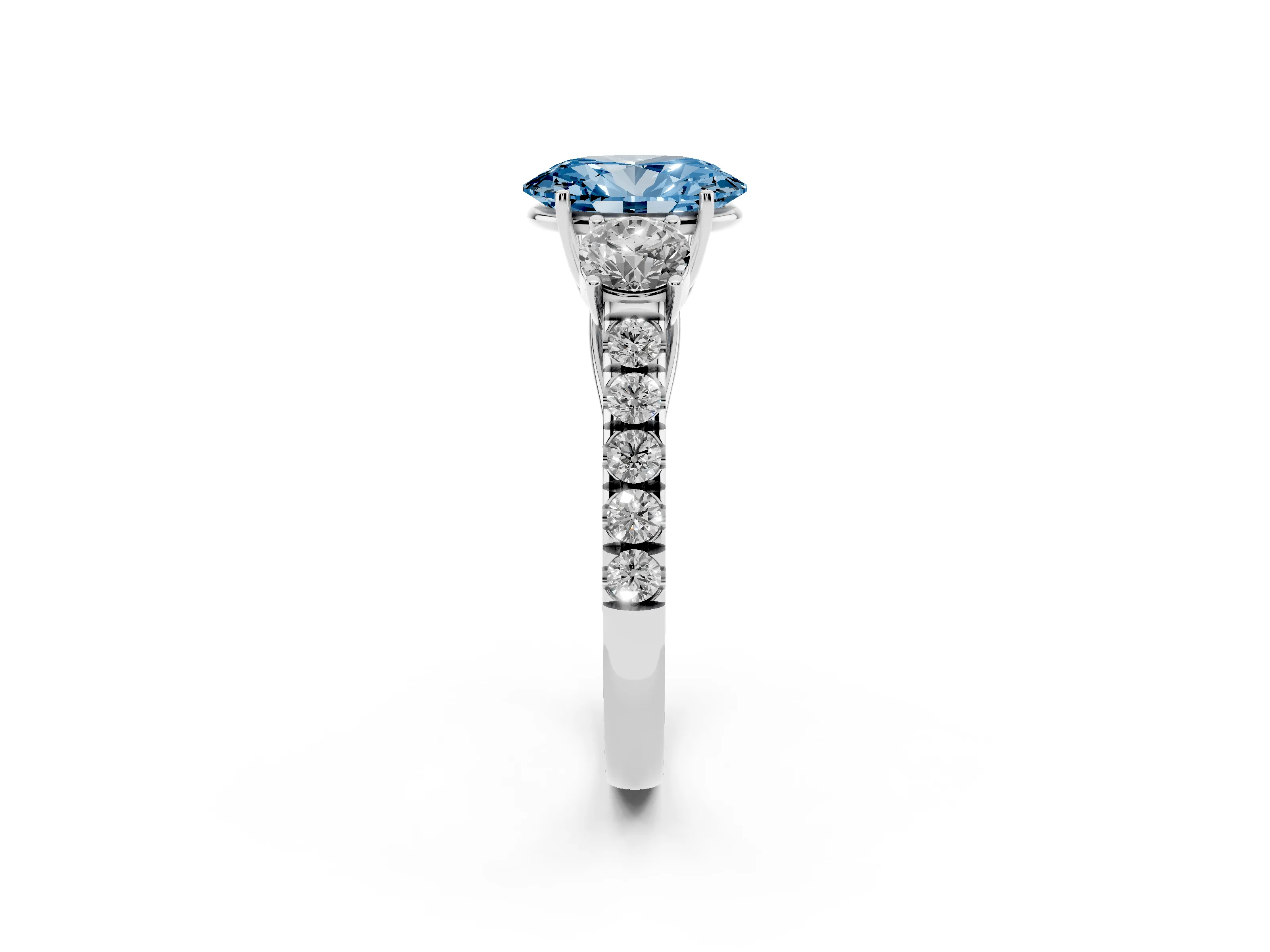 Fancy Blue Oval Cut Diamond Three-Stone Ring Set in White gold with Round Side Stones and Delicate Pavé Band