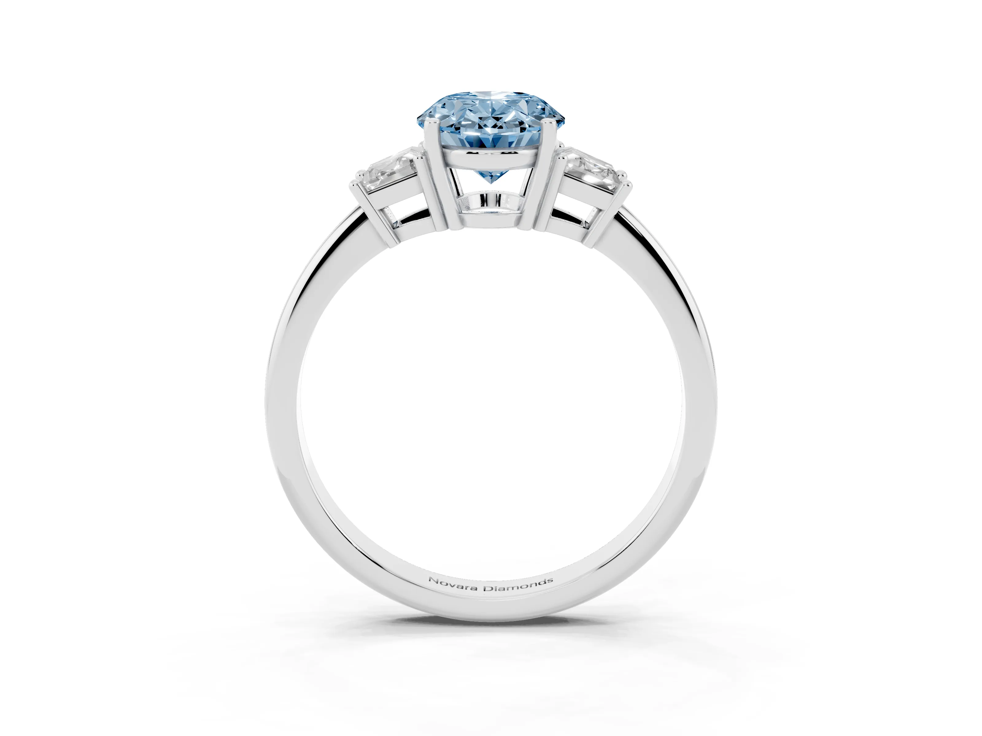 Fancy Blue Oval Cut Diamond Three-Stone Ring Set in White gold with Trapezoid Side Stones and Prong Setting