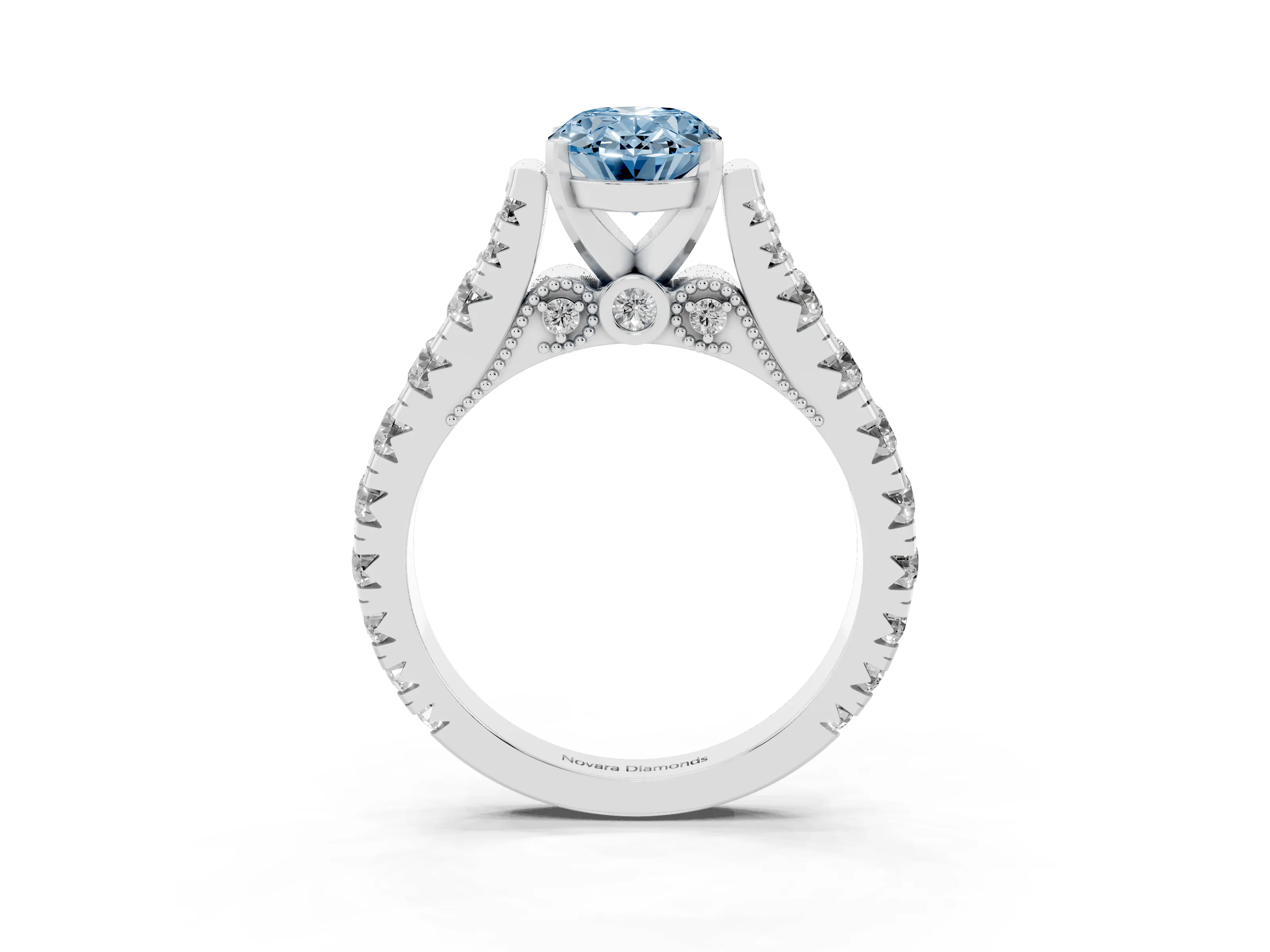 Fancy Blue Oval Cut Diamond Classic Solitaire Ring Set in White gold with Pavé Band and Prong Setting