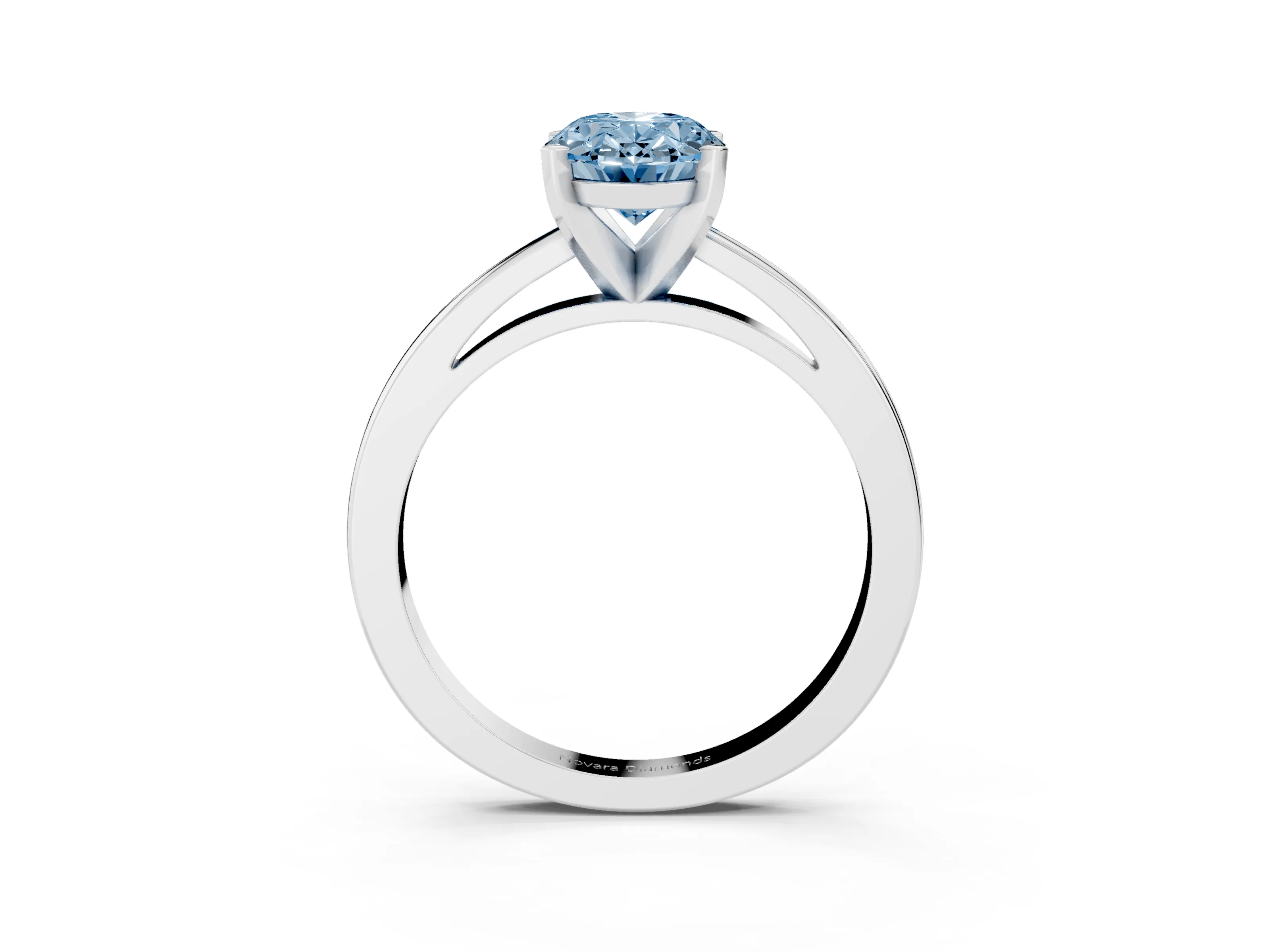 Fancy Blue Oval Cut Diamond Solitaire Engagement Ring Set in Silver with Prong Setting on a Classic Band