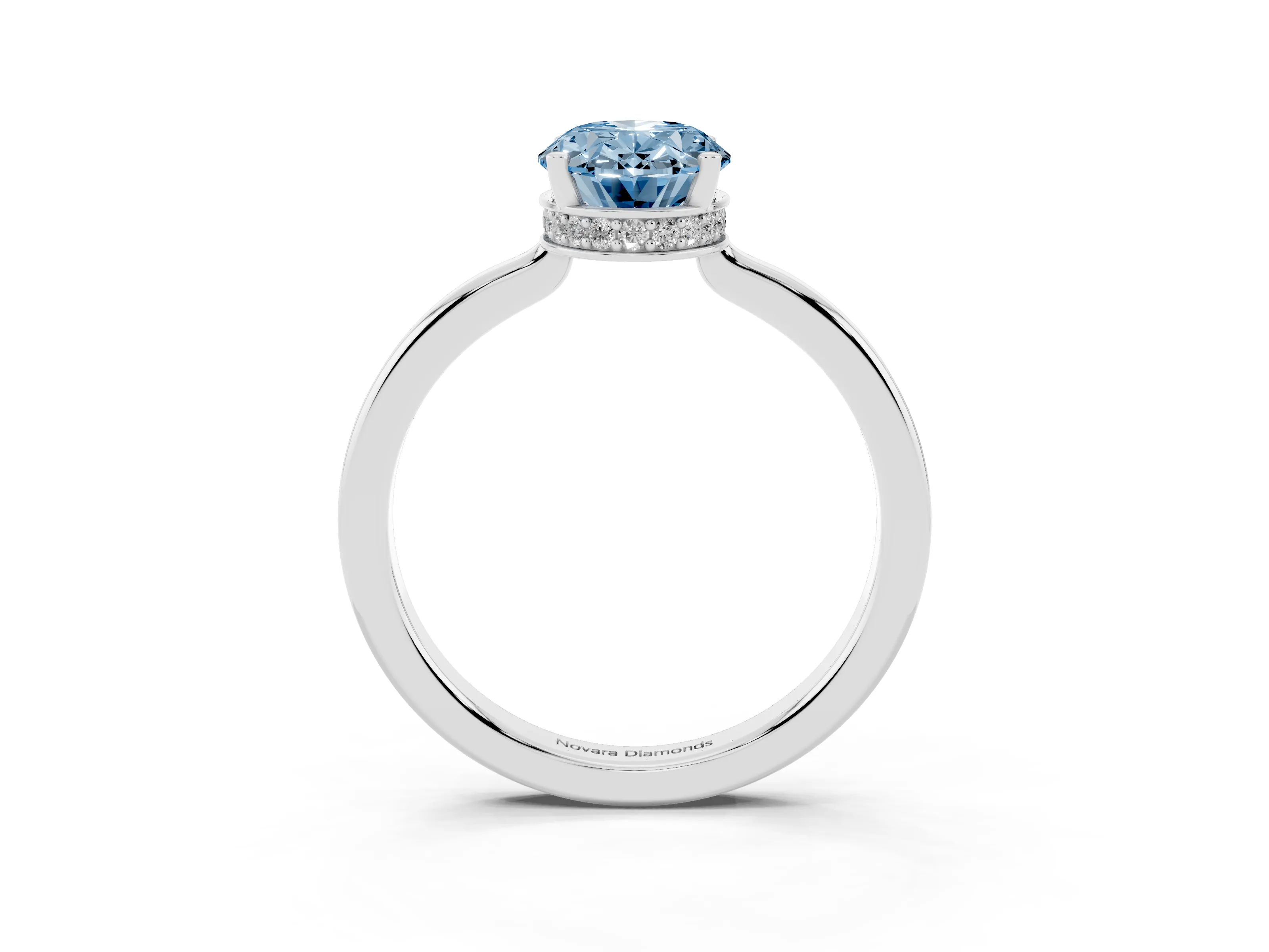 Fancy Blue Oval Cut Diamond Solitaire Engagement Ring Set in Silver with Prong Setting on a Plain Band