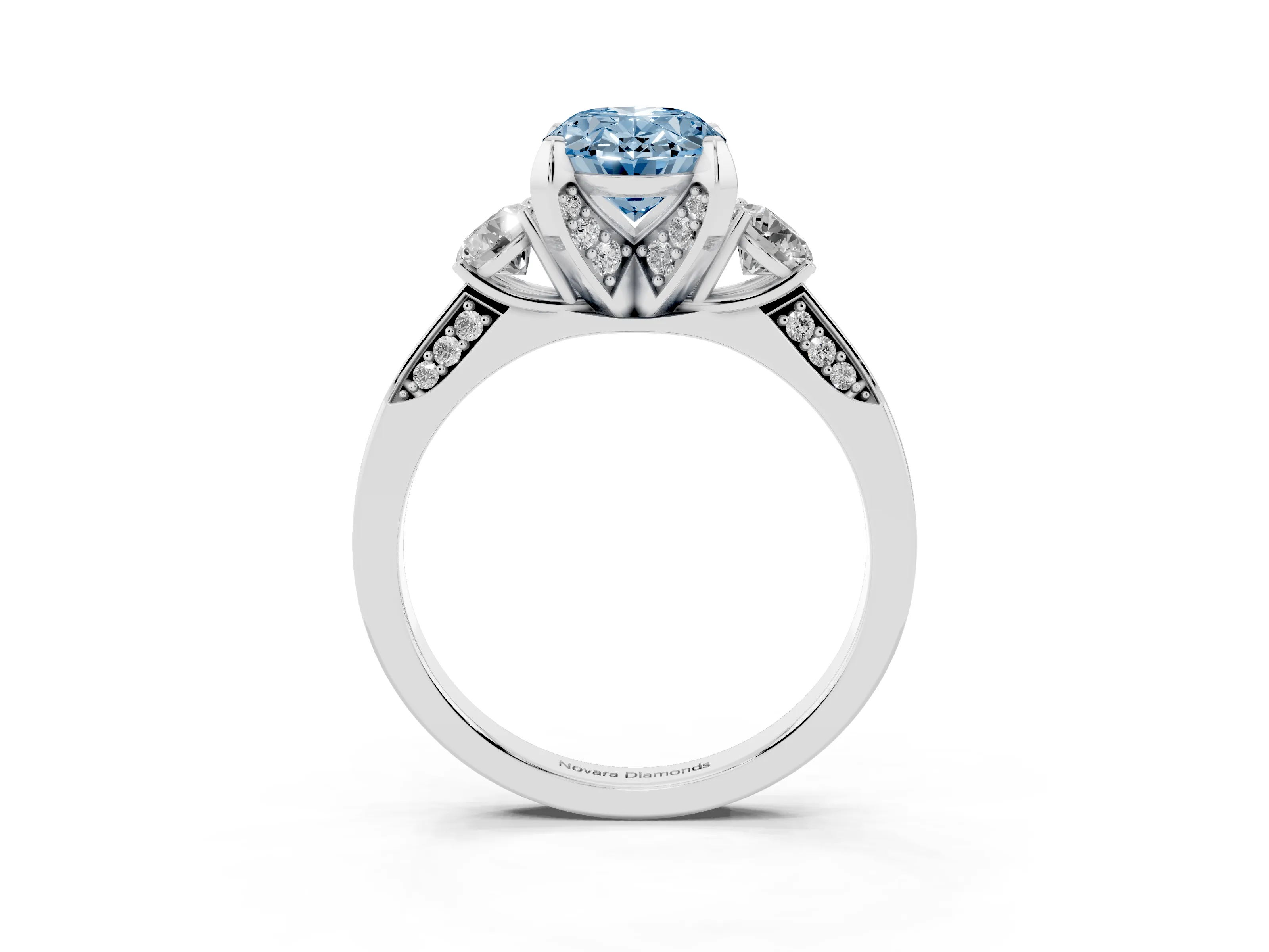Fancy Blue Oval Cut Diamond Three-Stone Ring Set in White gold with Pavé Band and Smaller Side Stones