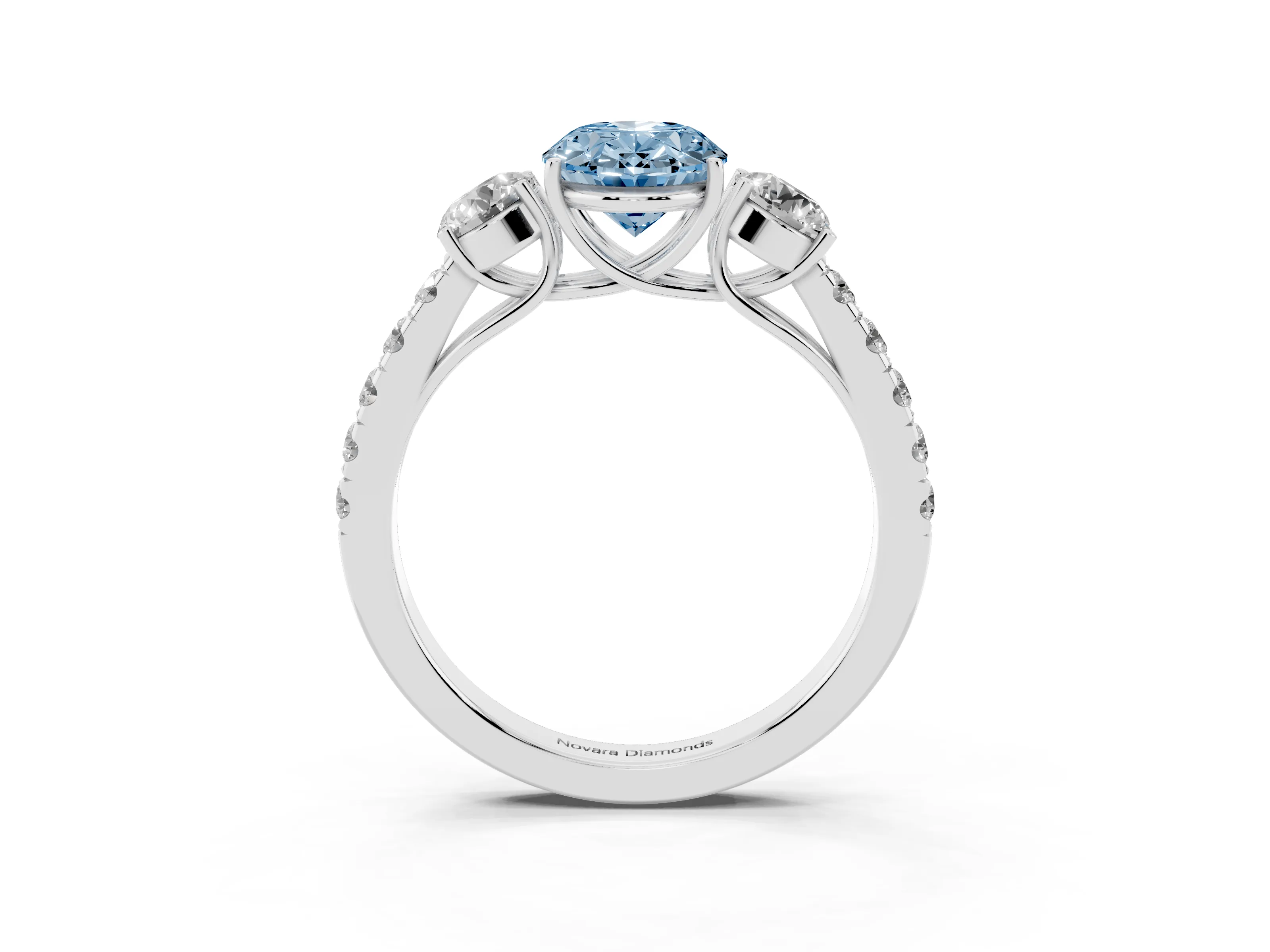 Fancy Blue Oval Cut Diamond Three-Stone Ring Set in White gold with Round Side Stones and Delicate Pavé Band