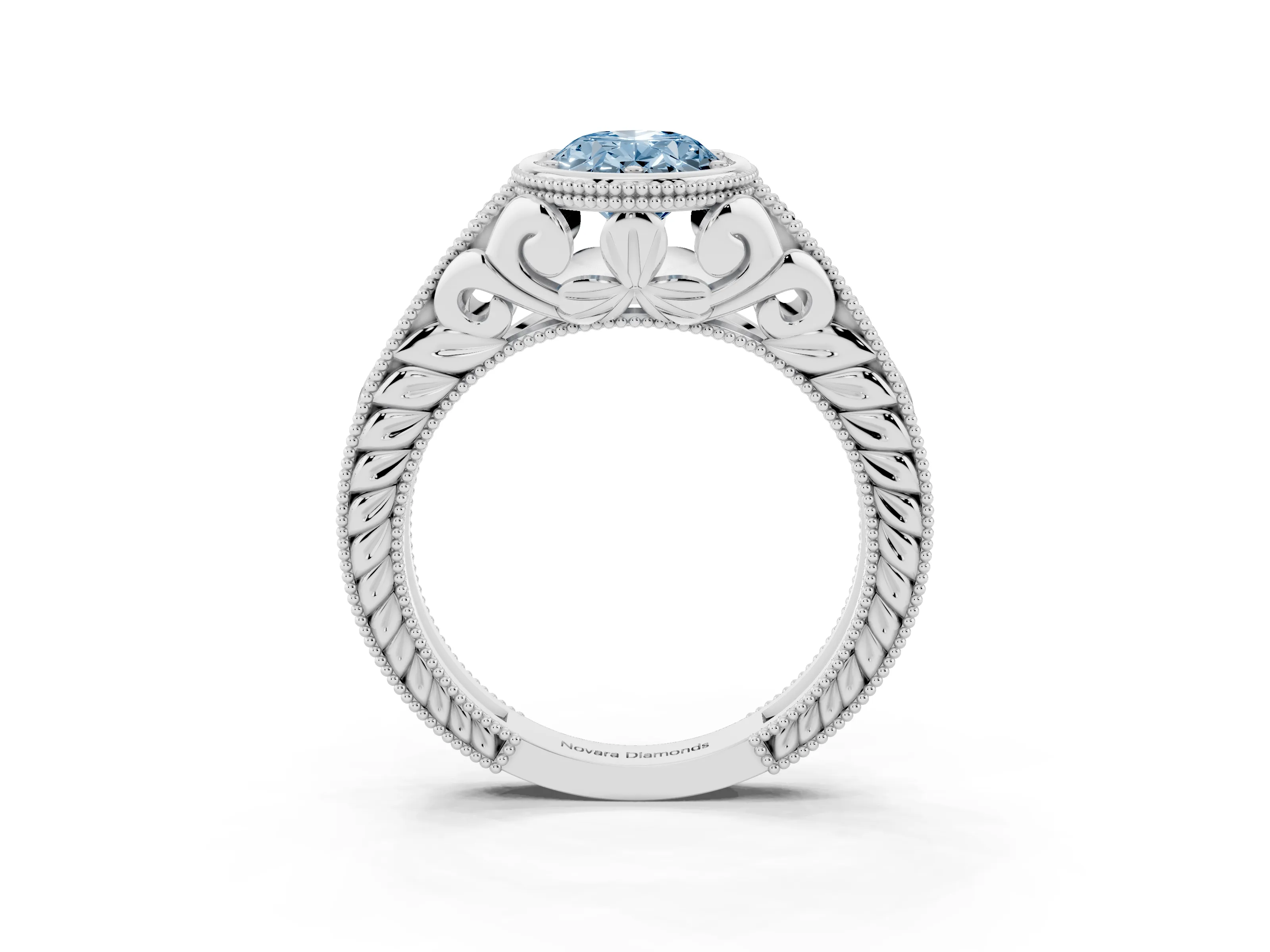 Fancy Blue Bezel Set Oval Cut Diamond Milgrain Pavé Engagement Ring Set in Silver