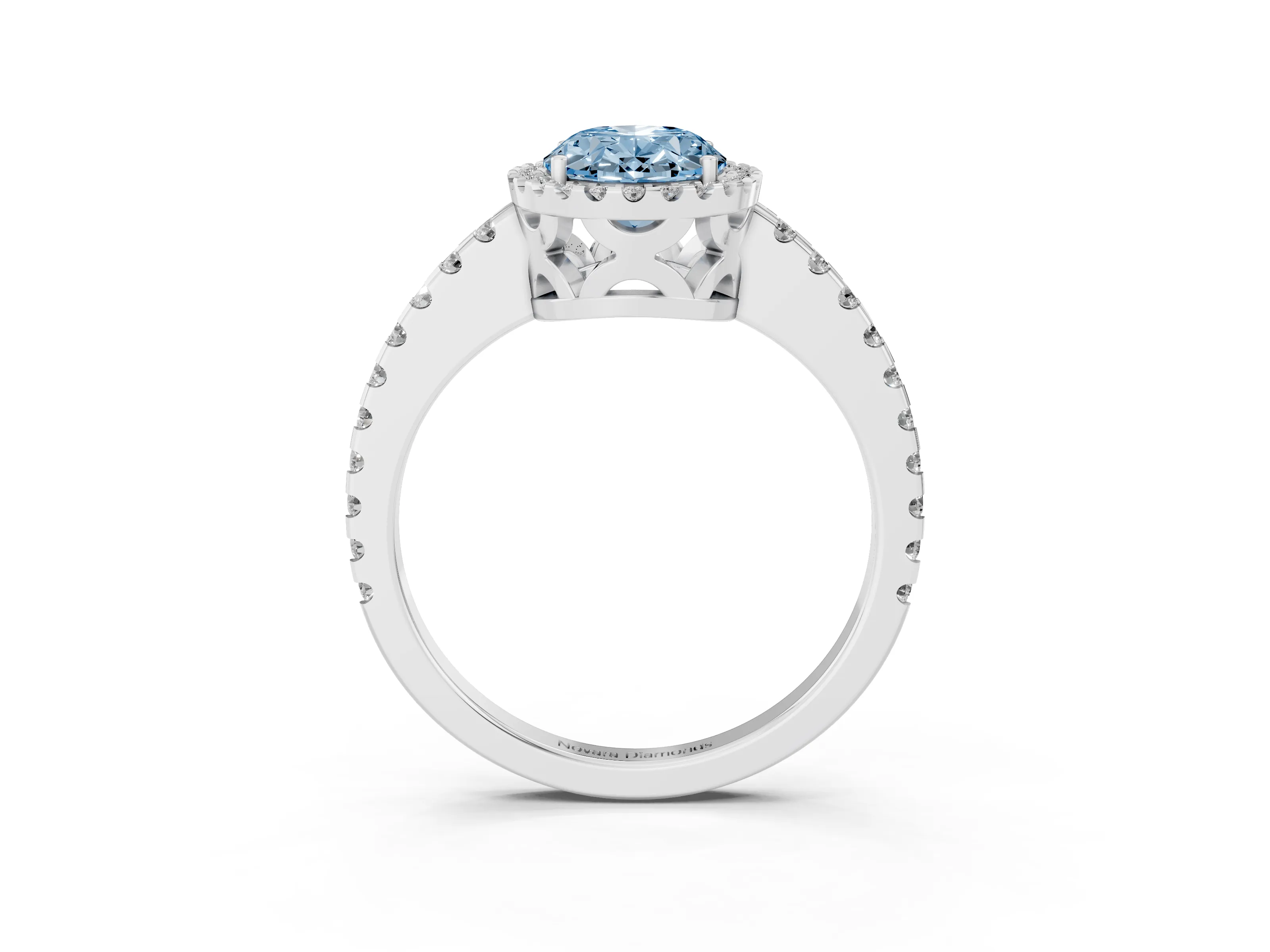 Fancy Blue Oval Cut Diamond Halo Ring Set in Platinum with Pavé Shoulders and Halo-Framed Center