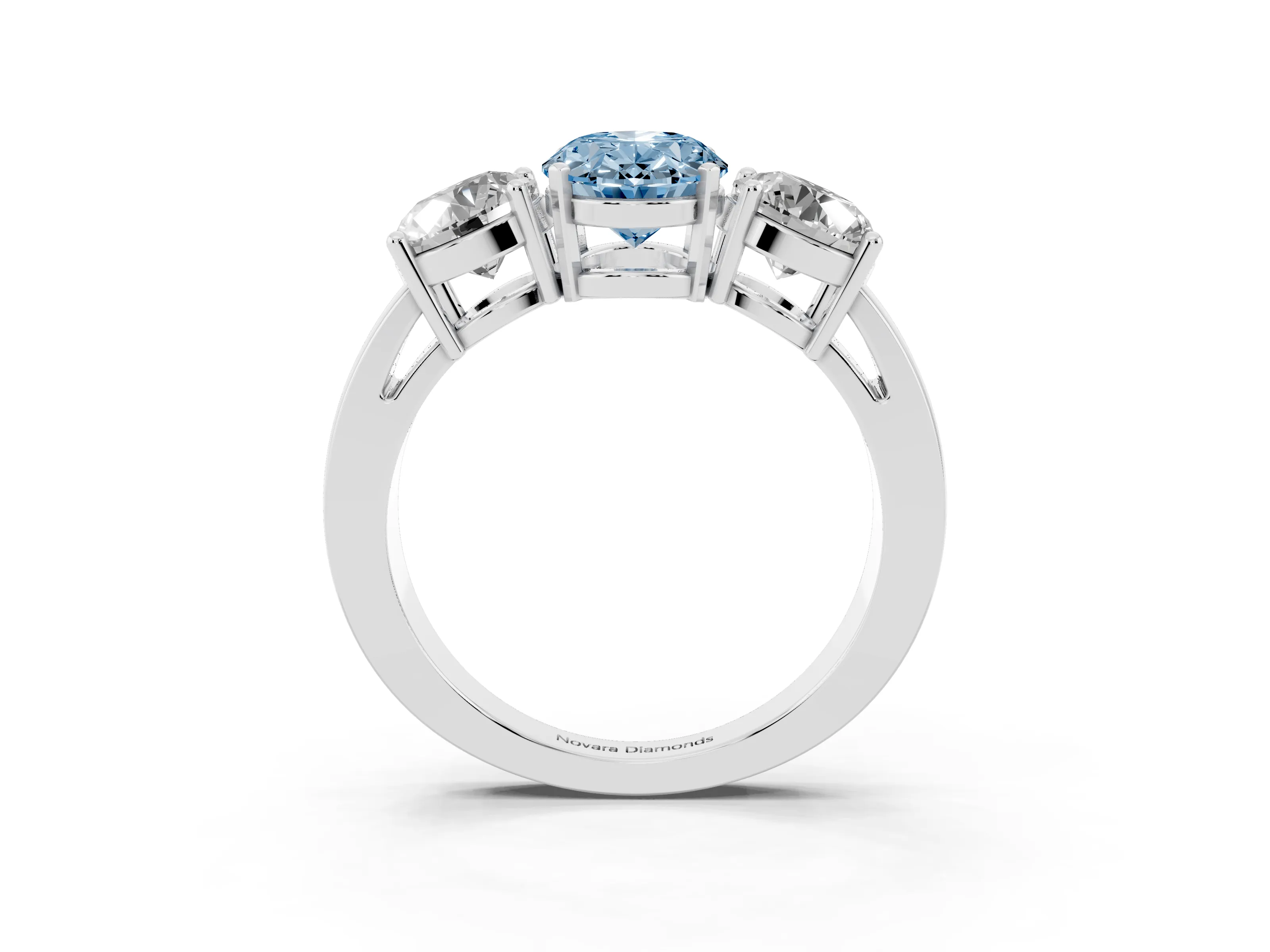 Fancy Blue Oval Cut Diamond Three-Stone Ring Set in Platinum with Round Side Stones and Classic Band